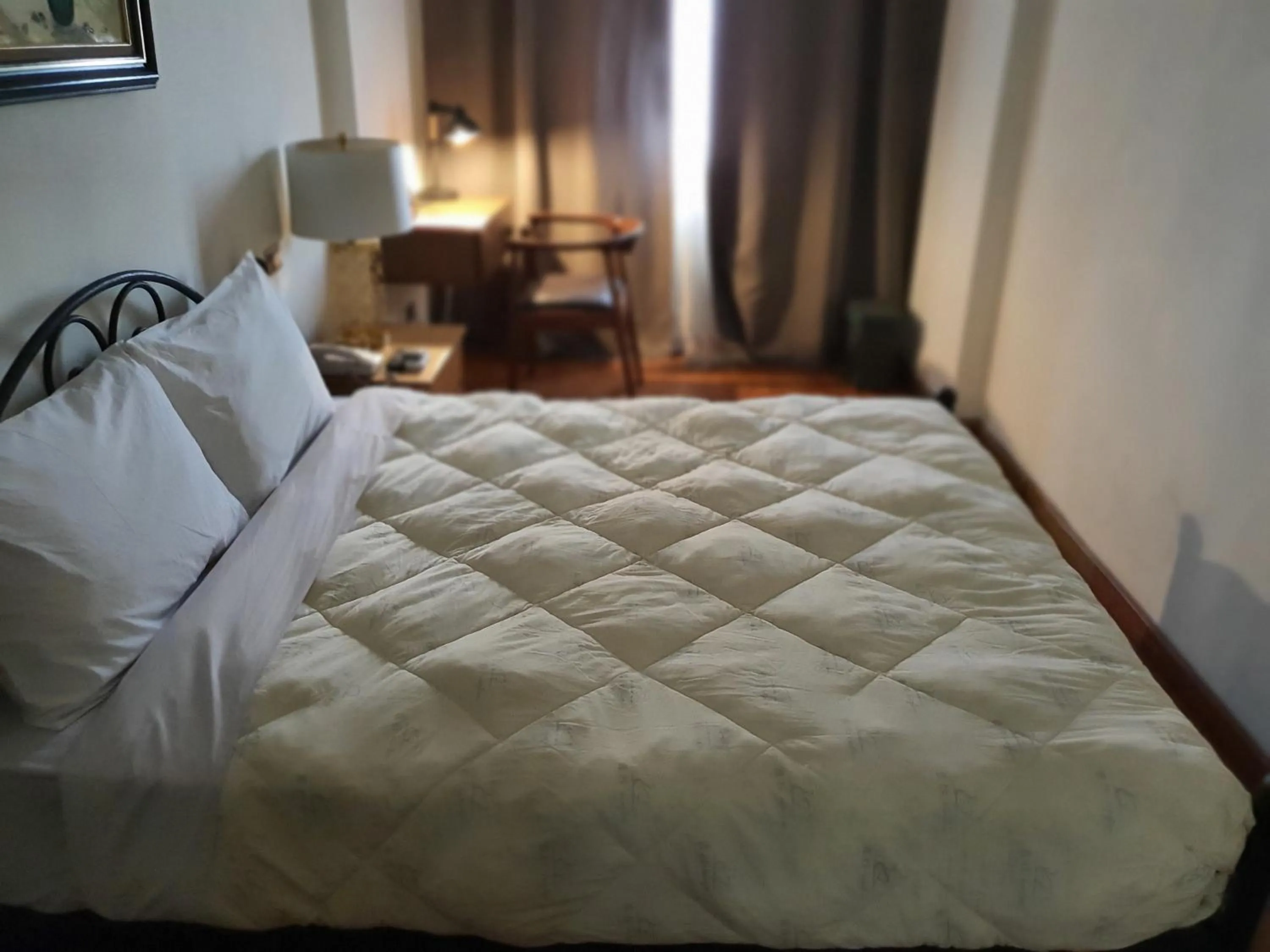 Bedroom in Memory Hotel