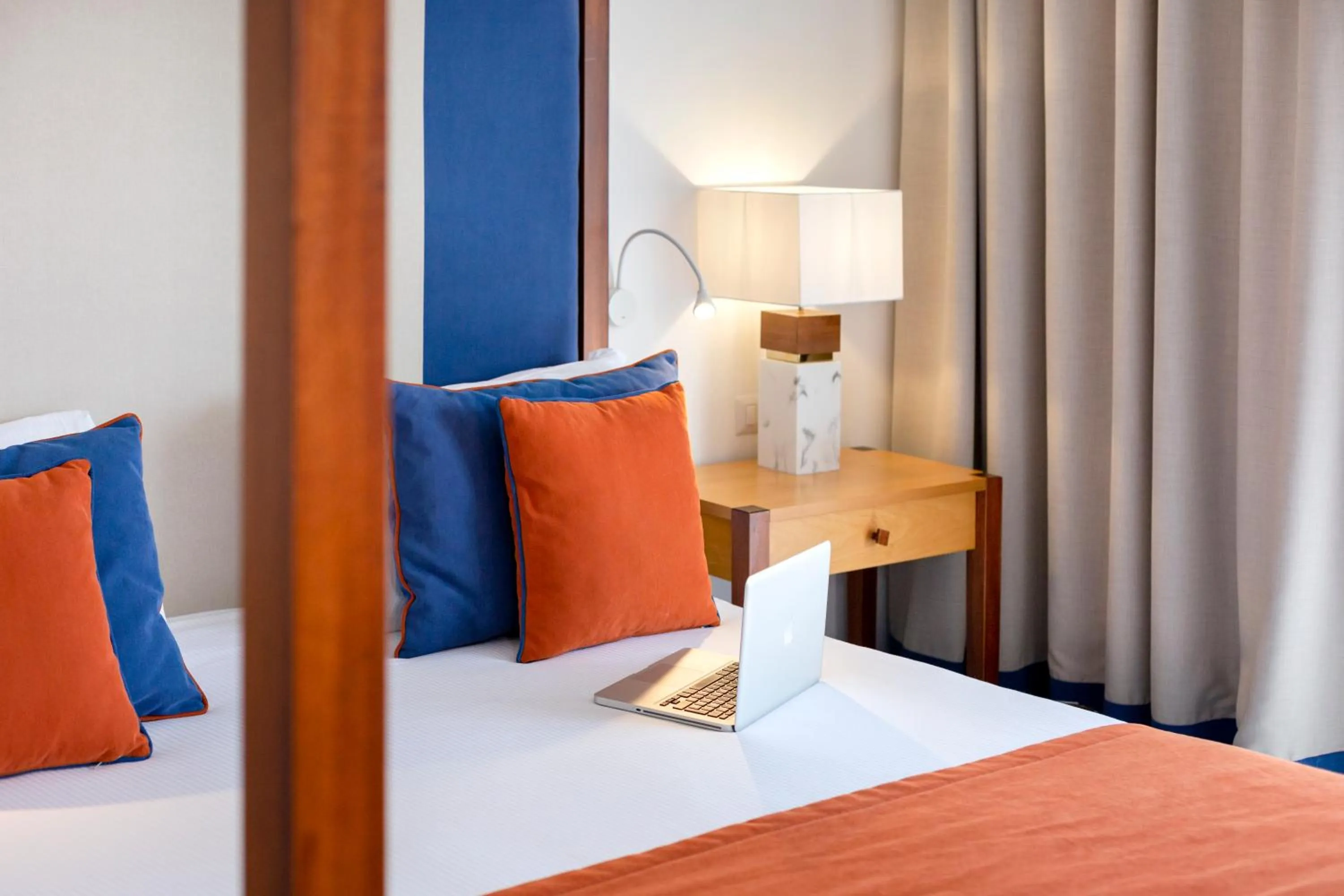 Bed in Atlantic Palace Hotel