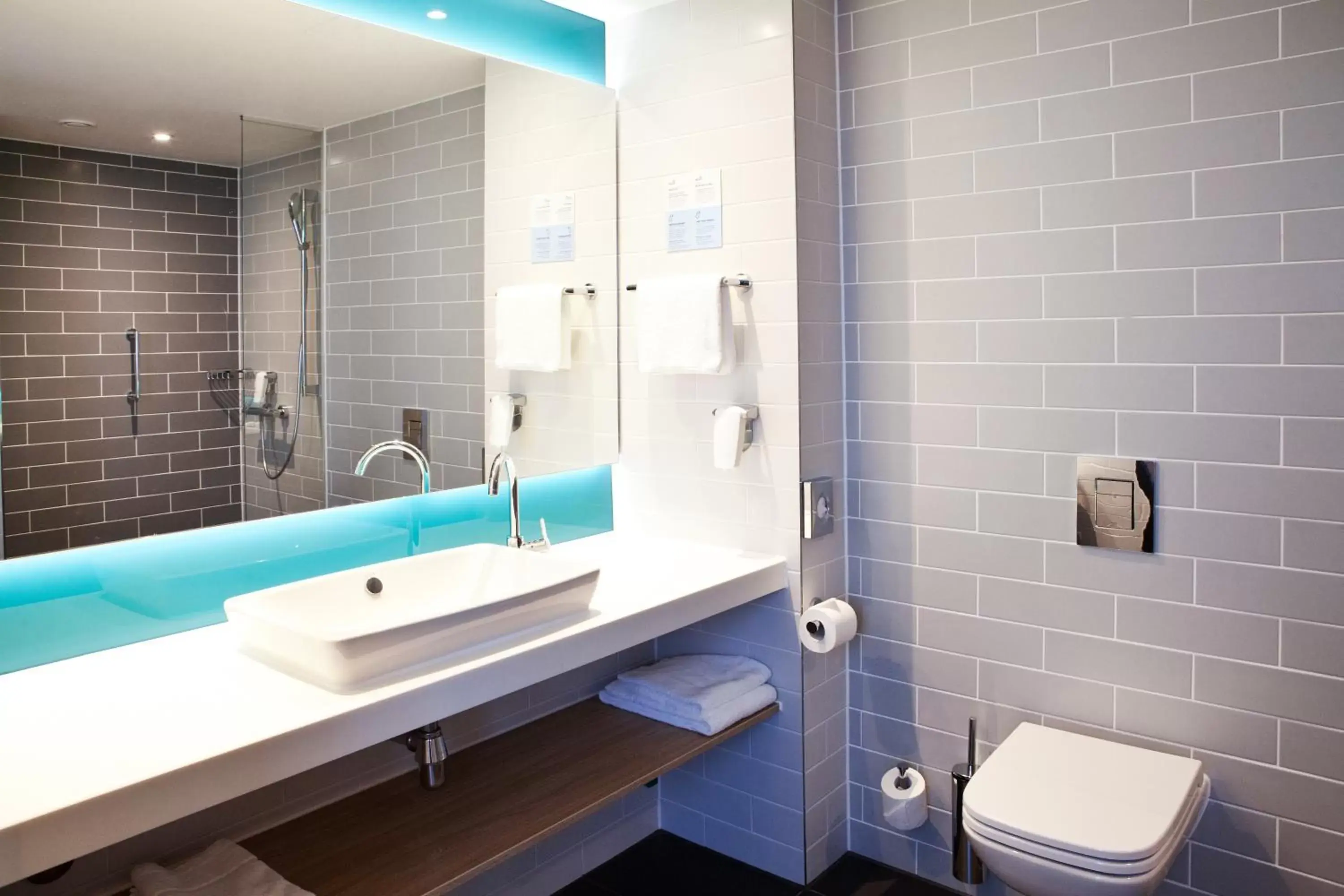 Toilet, Bathroom in Holiday Inn Express Munich - Olching, an IHG Hotel