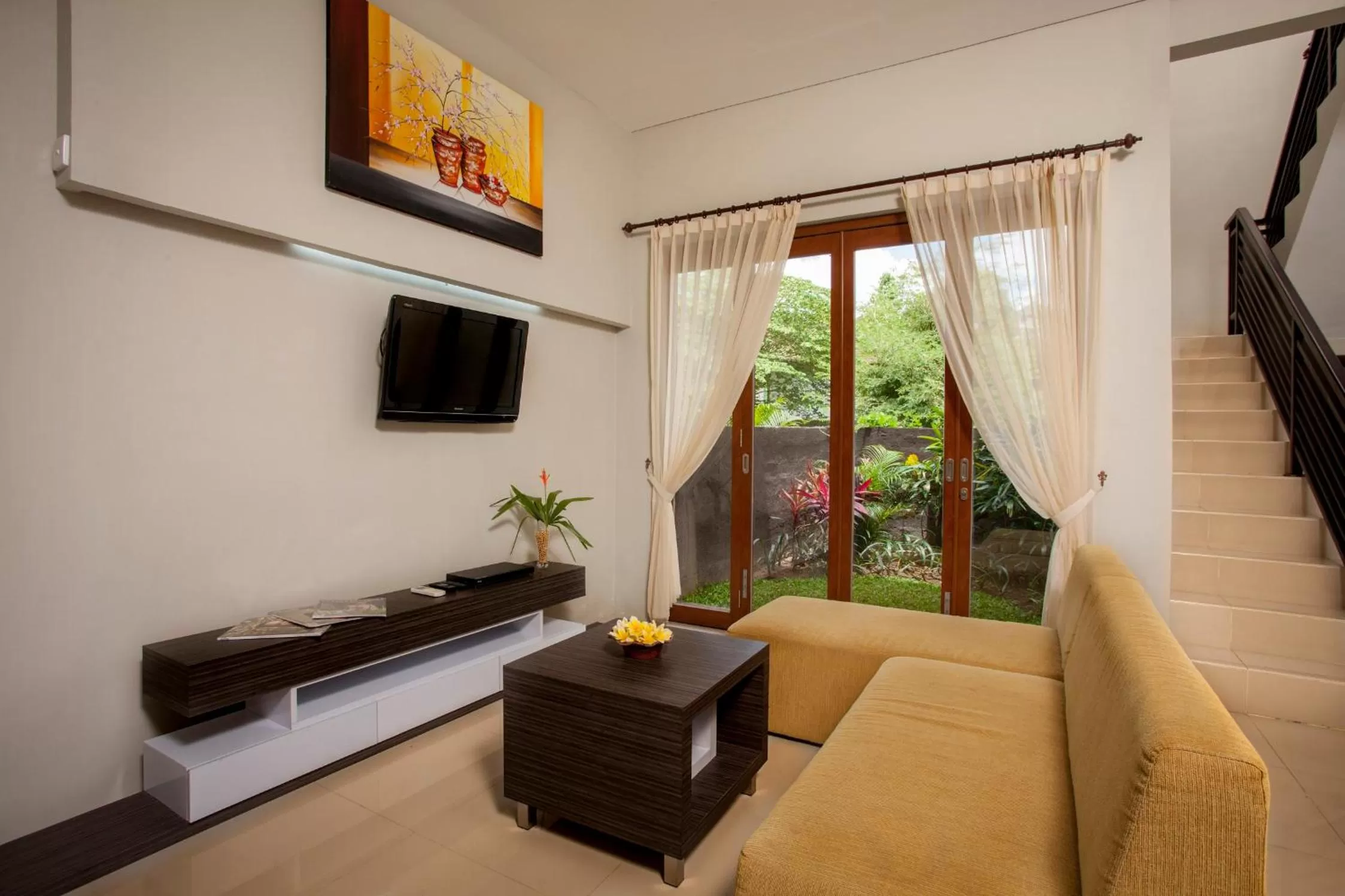 Communal lounge/ TV room in ABISHA Resort Jimbaran