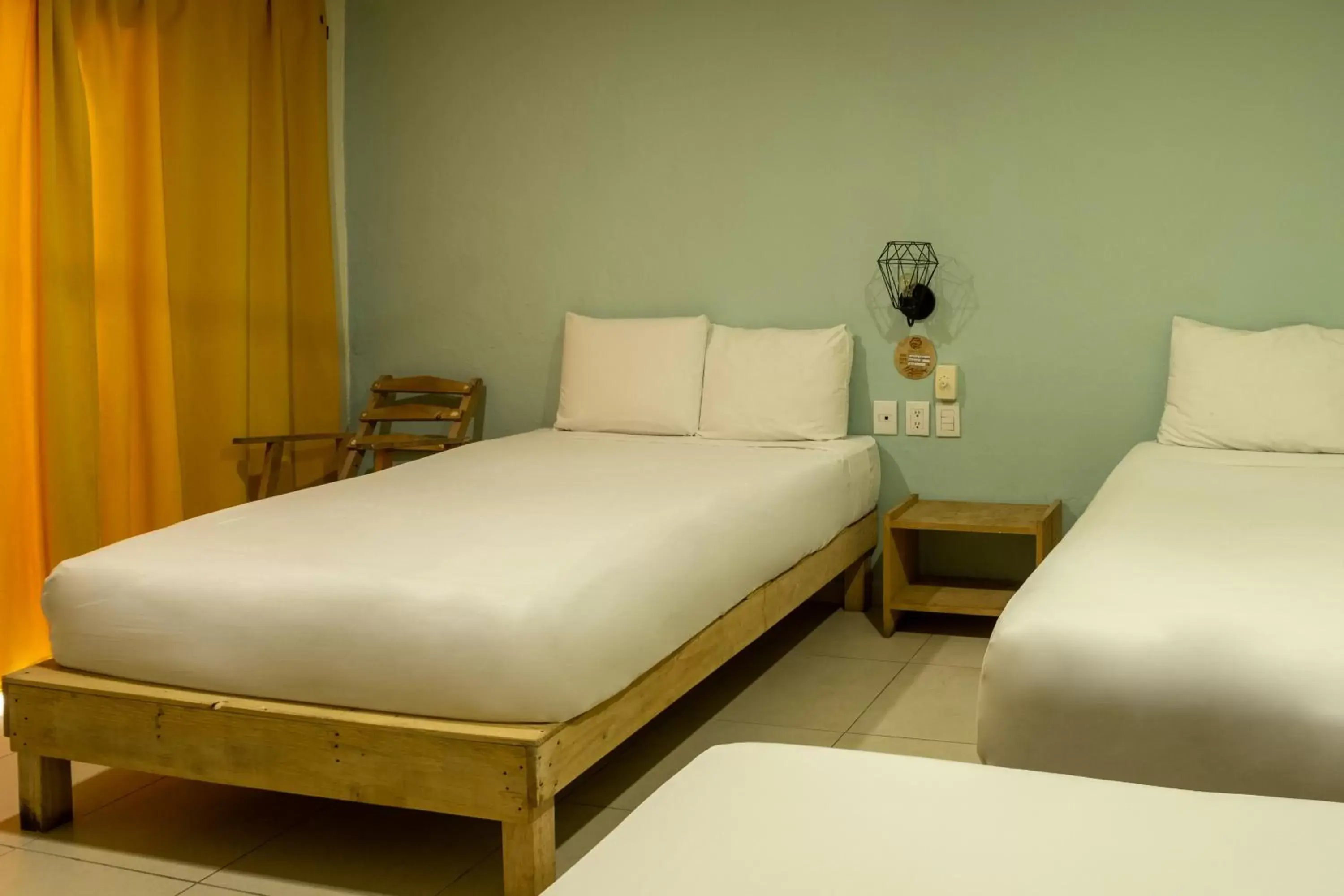 Bed in Hotel Paso del Mar