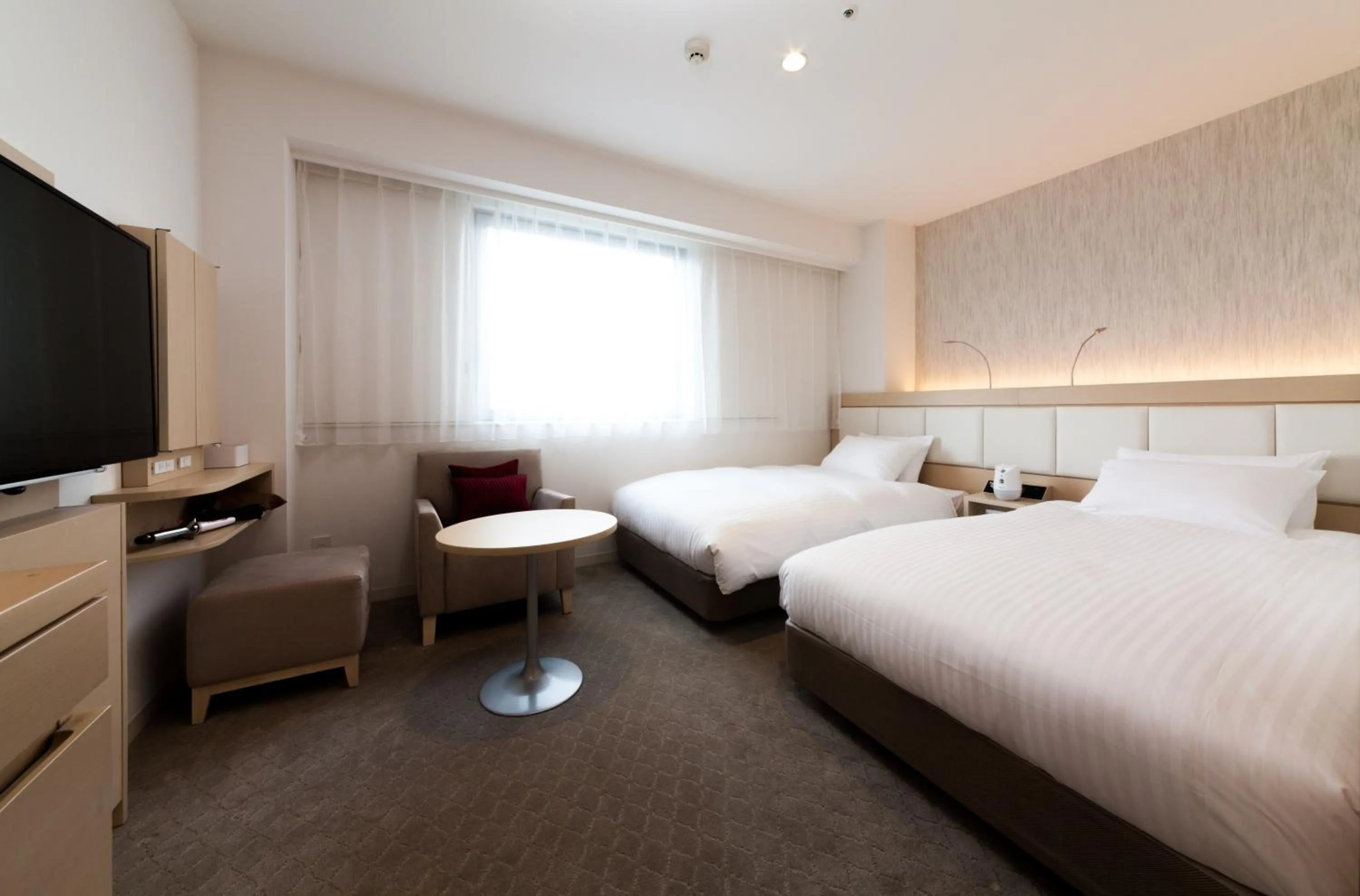 Photo of the whole room, Bed in Nishitetsu Hotel Croom Hakata