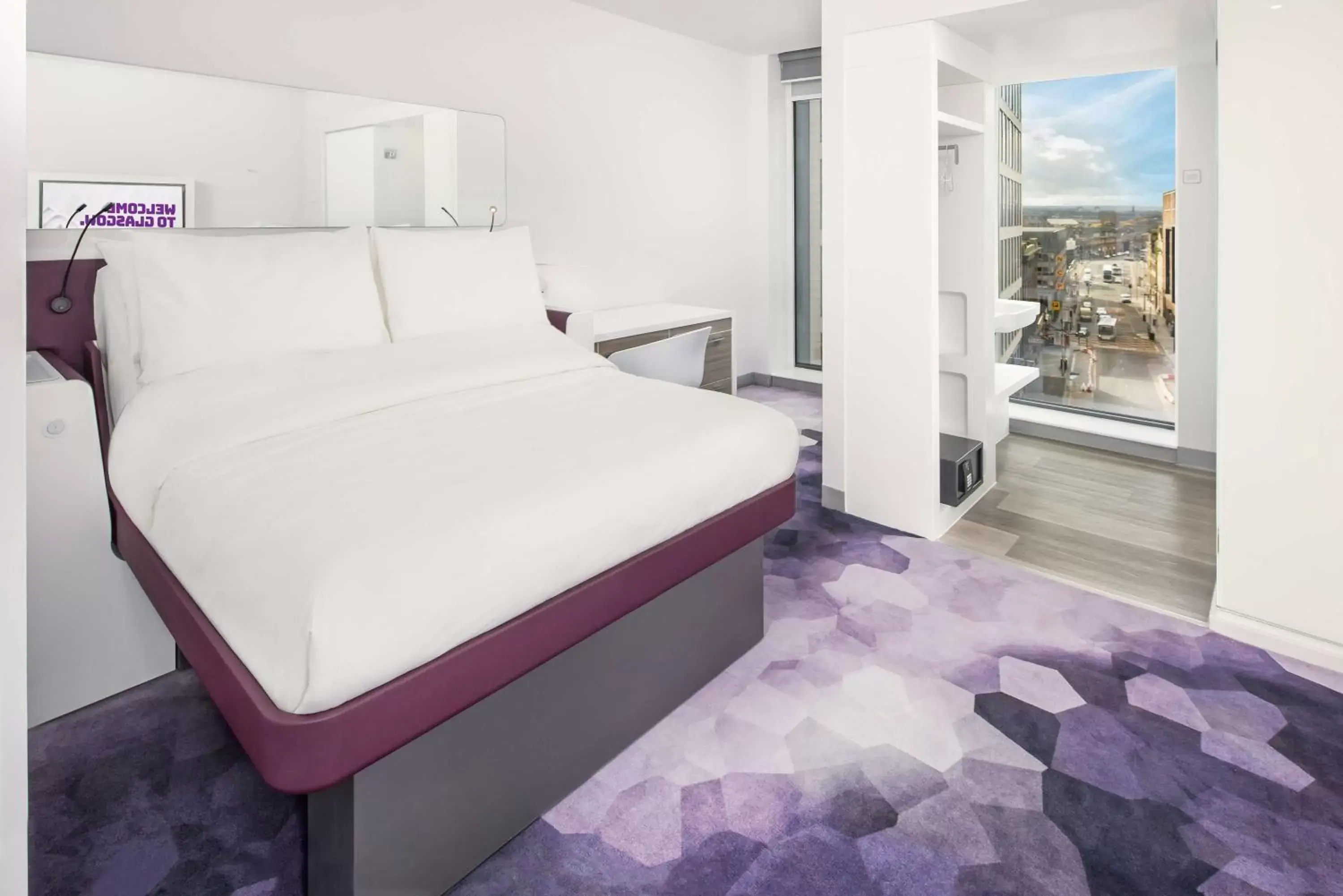 Photo of the whole room, Bed in YOTEL Glasgow