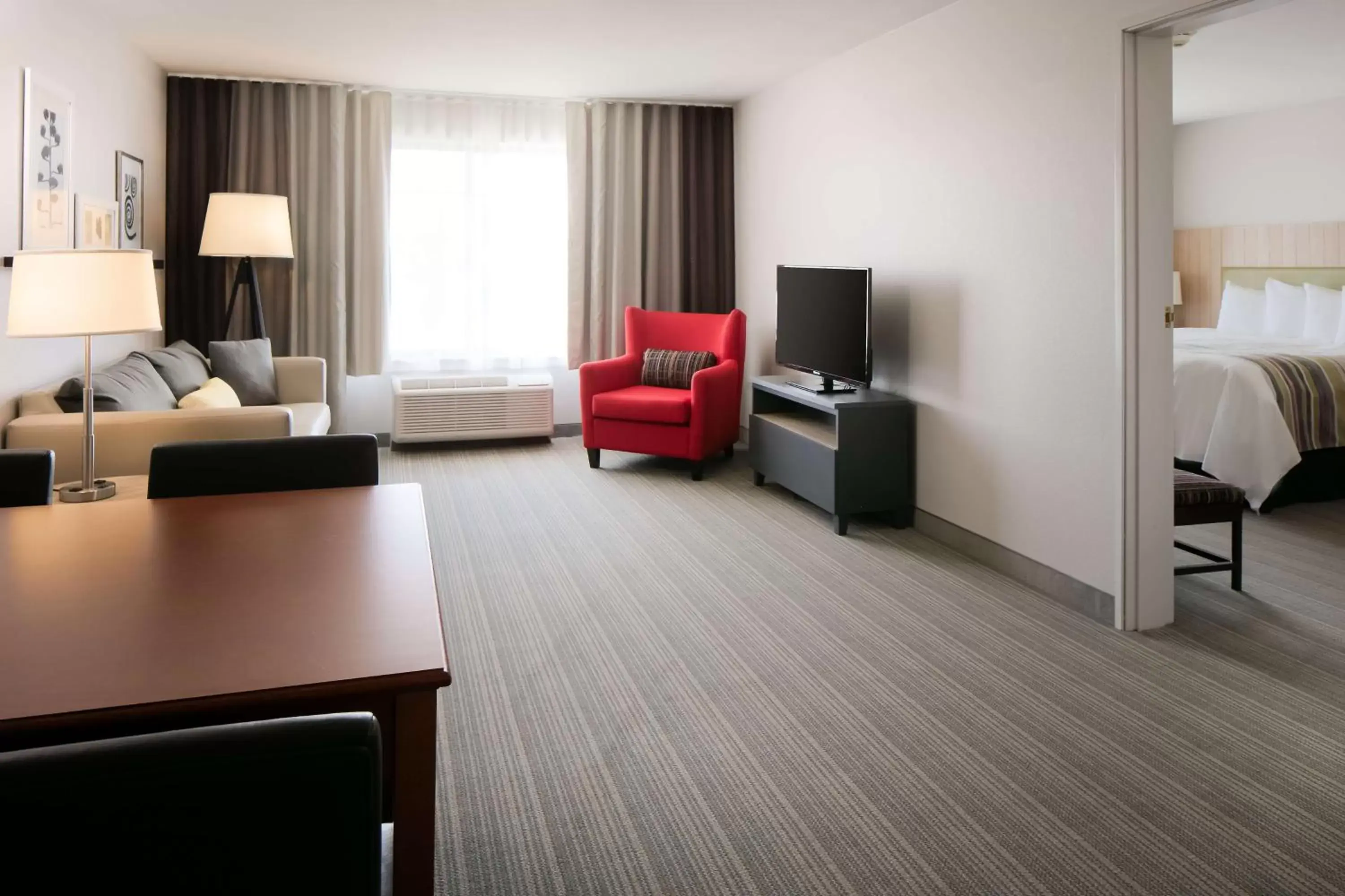 Photo of the whole room, Seating Area in Country Inn & Suites by Radisson, Madison West, WI