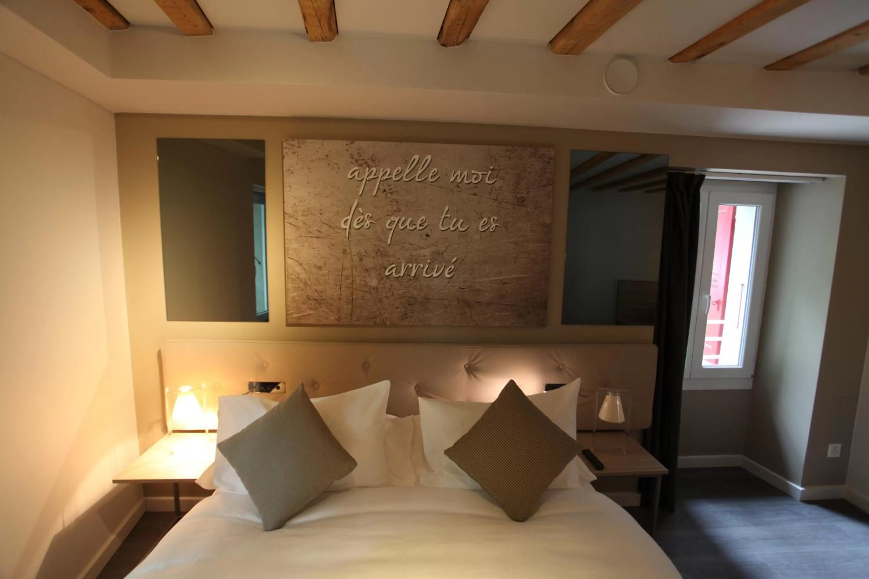 Bed in Chez Maman Hotel & Restaurant