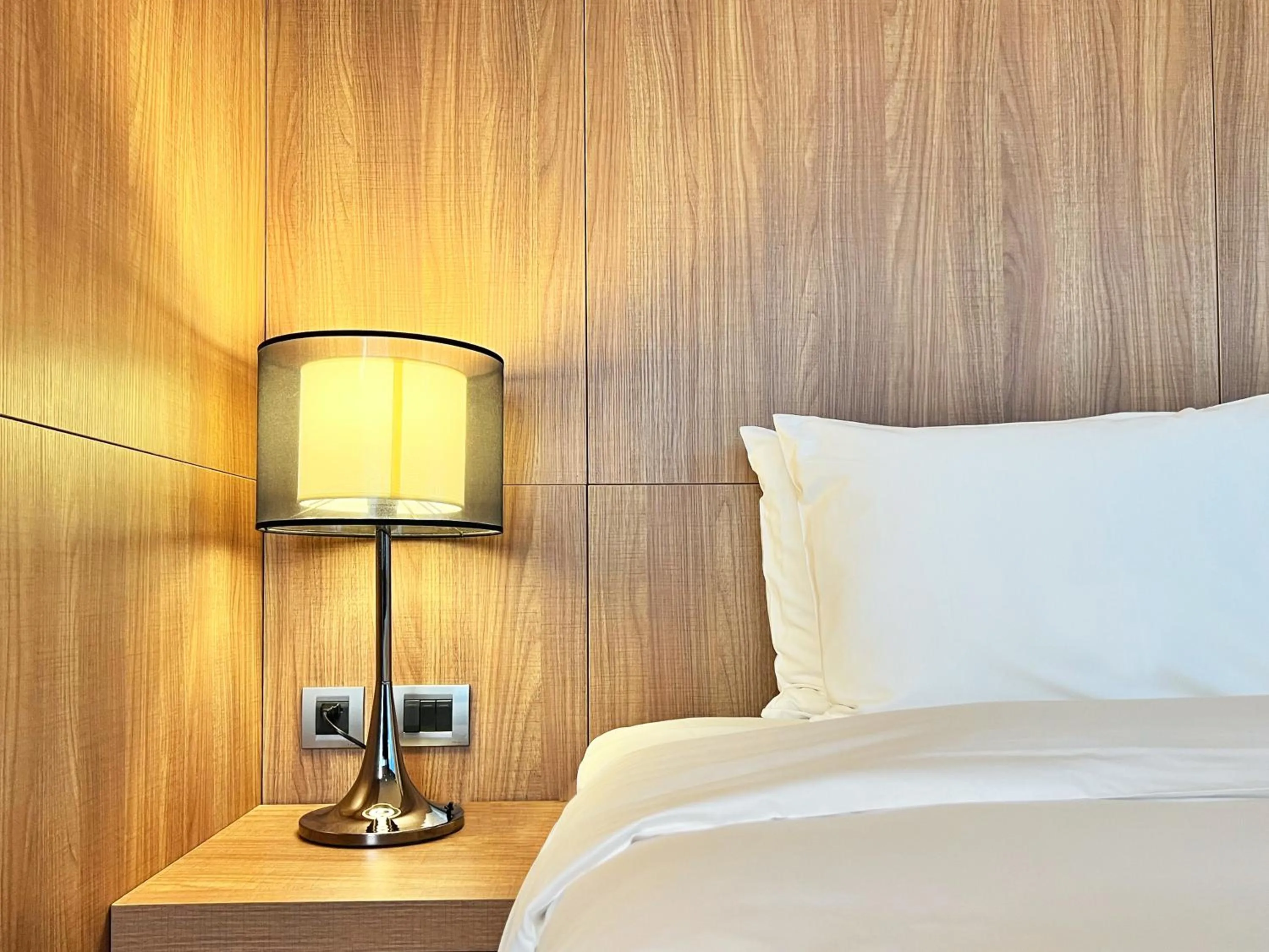 Bedroom in Wallsun Hotel