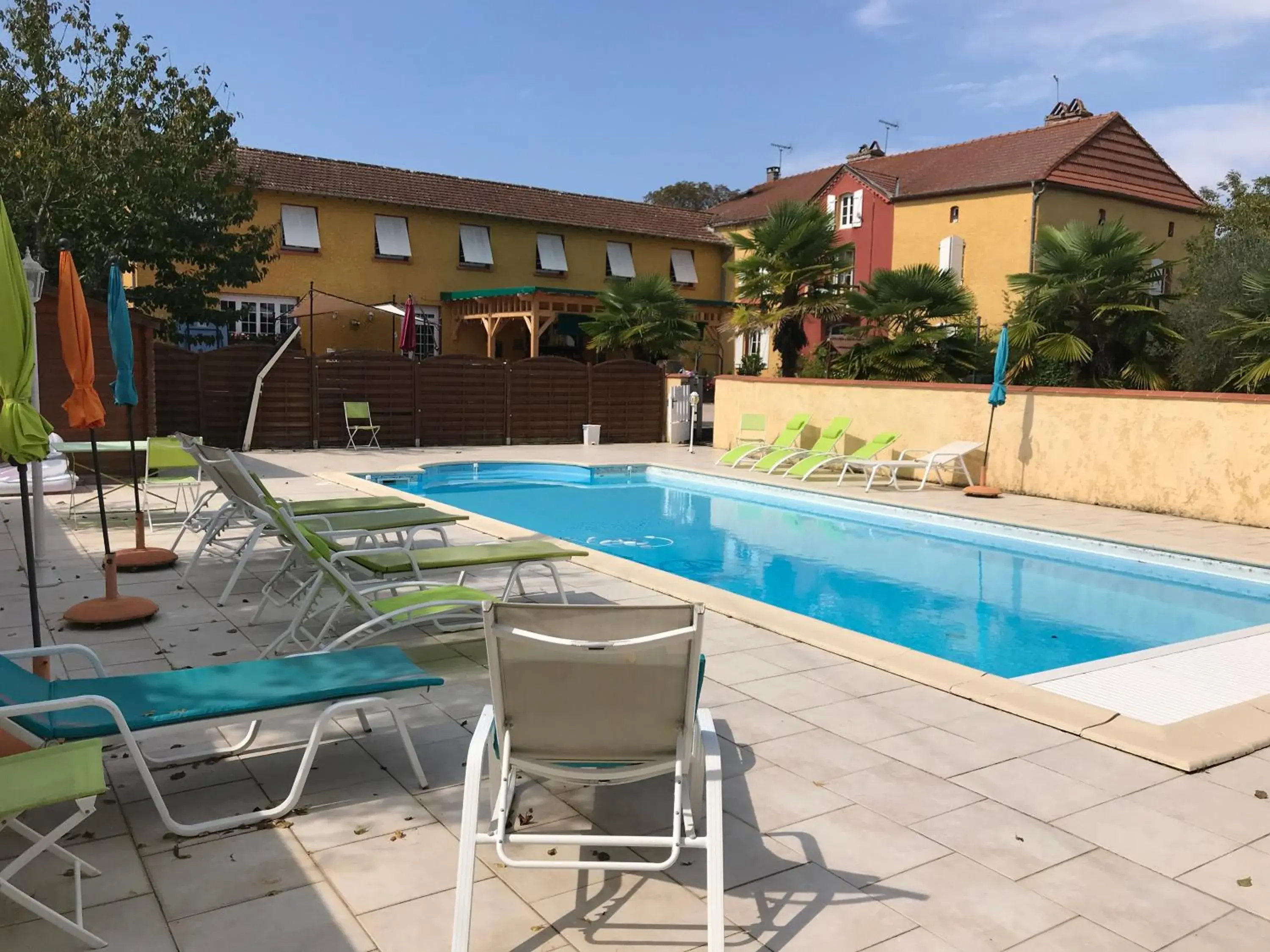 Swimming Pool in Logis Hôtel L'Adourable Auberge