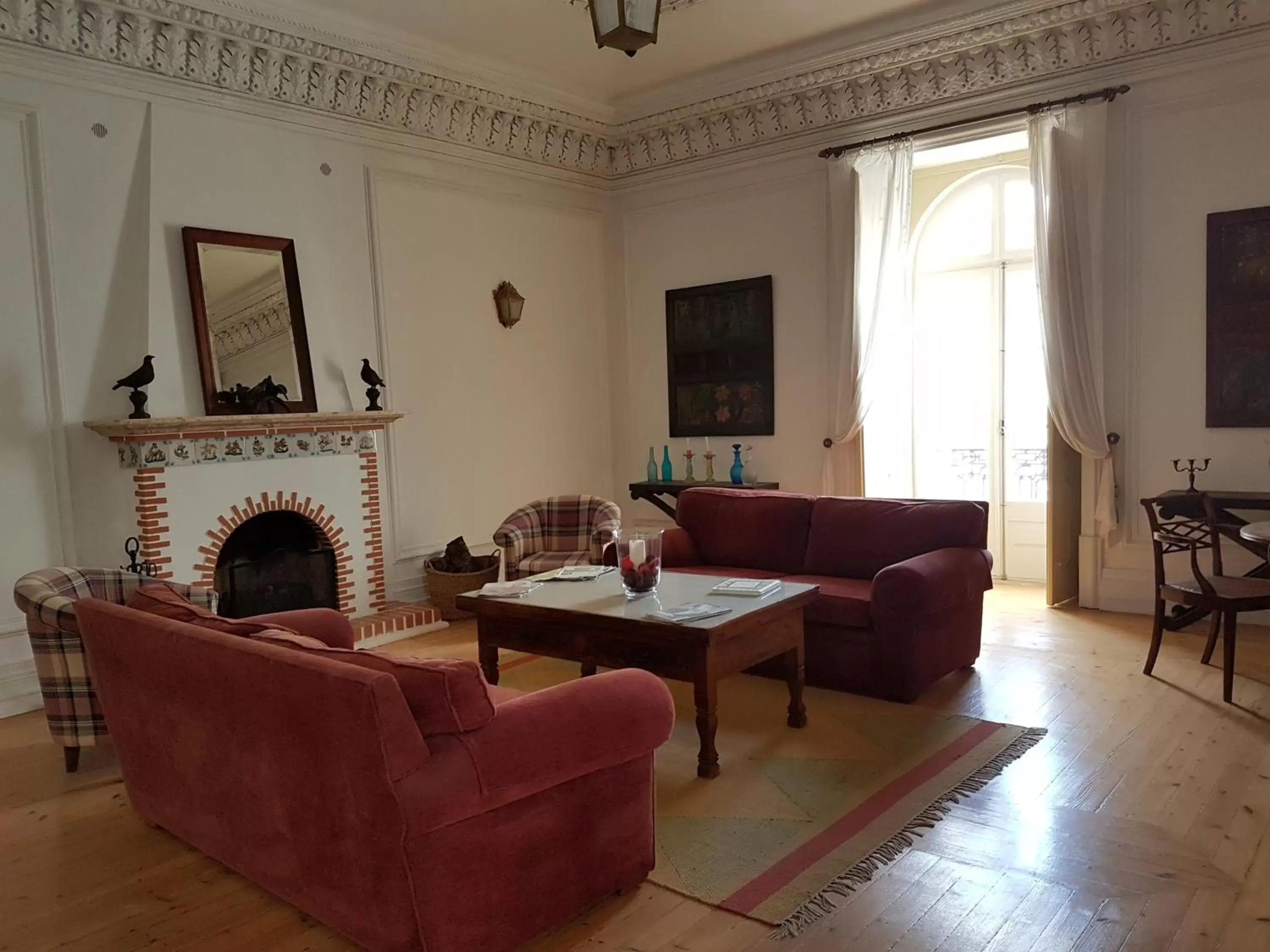 Communal lounge/ TV room, Seating Area in Hotel de Moura