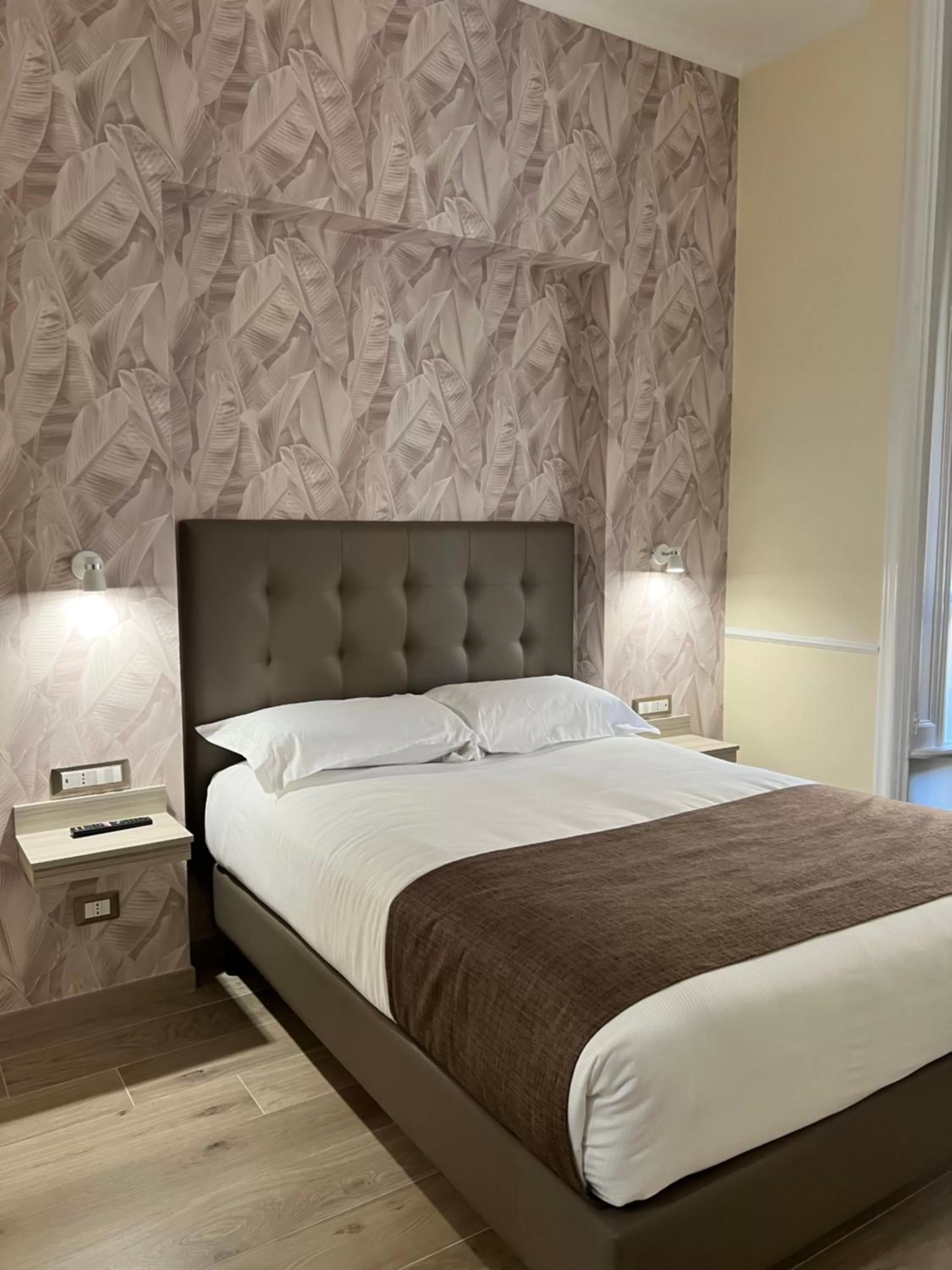 Bed in Hotel Le Petit