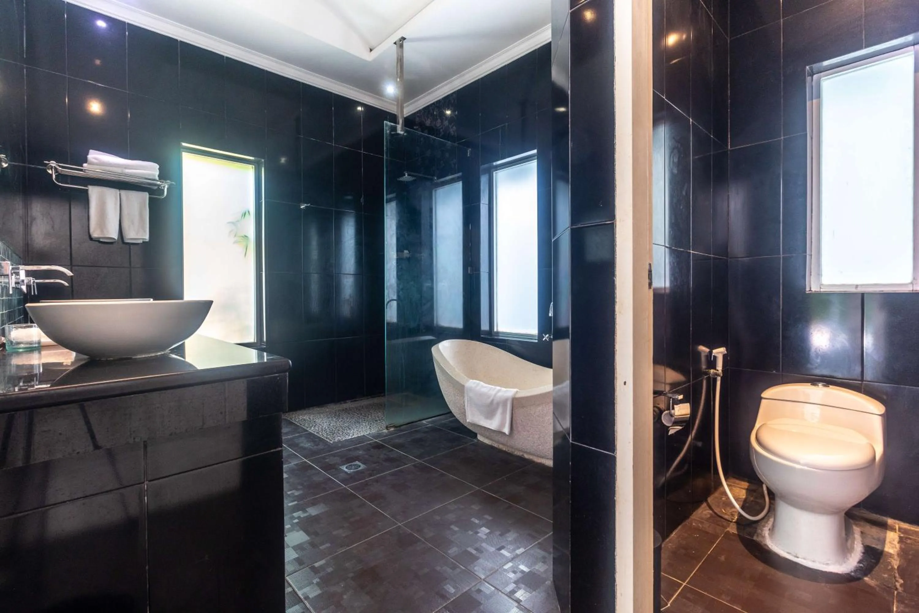 Shower in Aleesha Villas and Suites