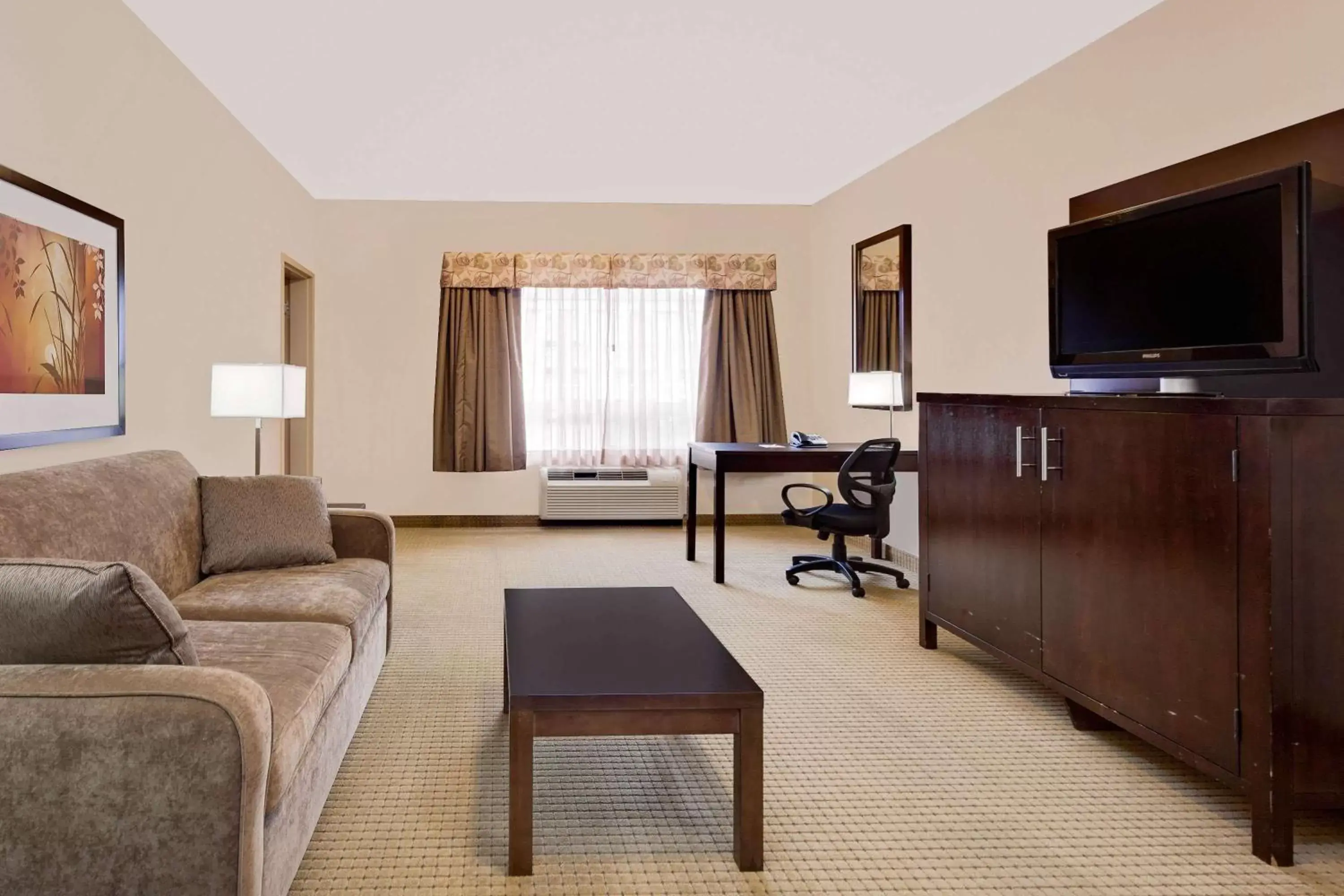 Living room, Seating Area in Ramada by Wyndham Lac La Biche