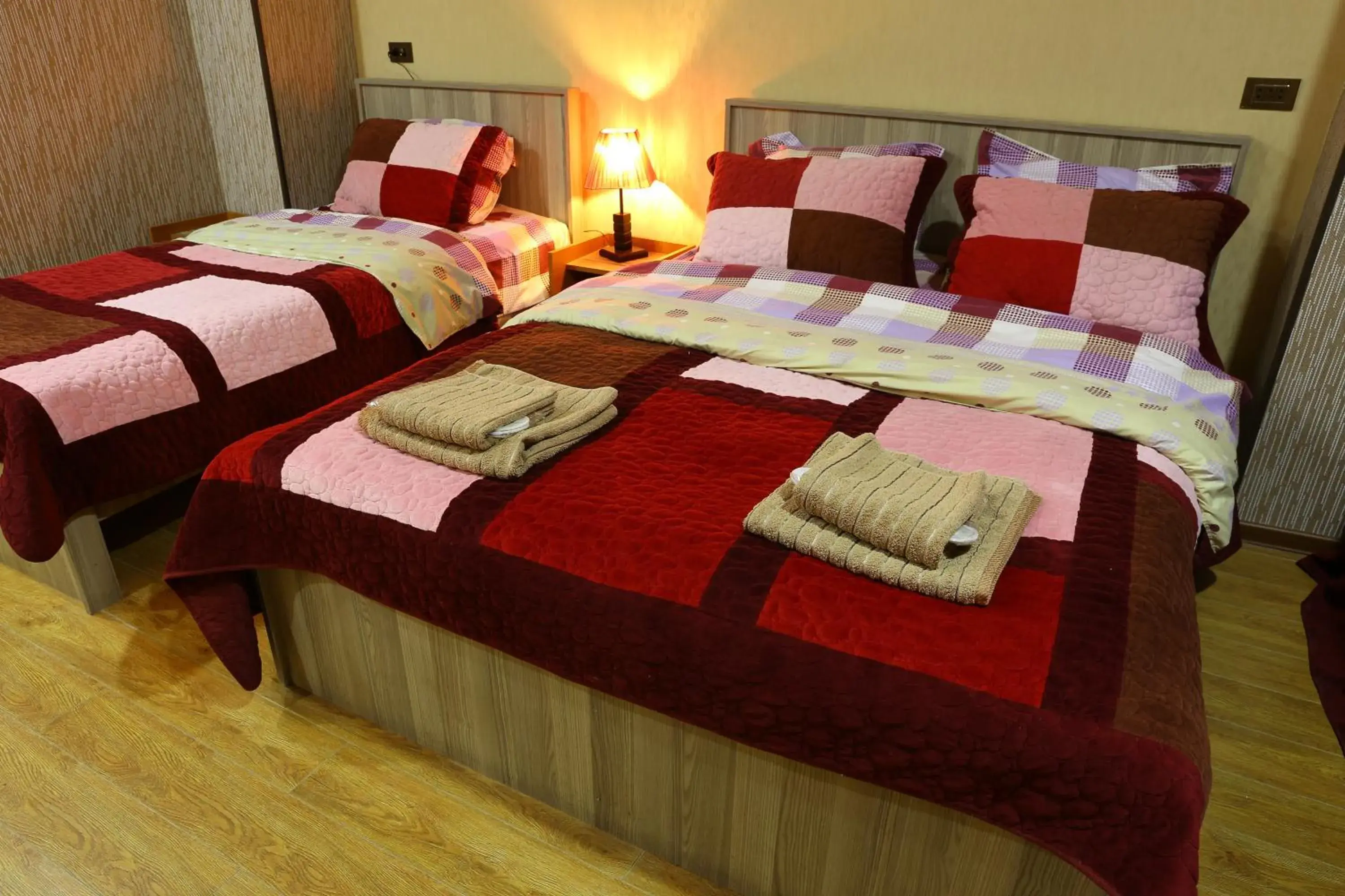 Bed in Dkd-bridge Hotel