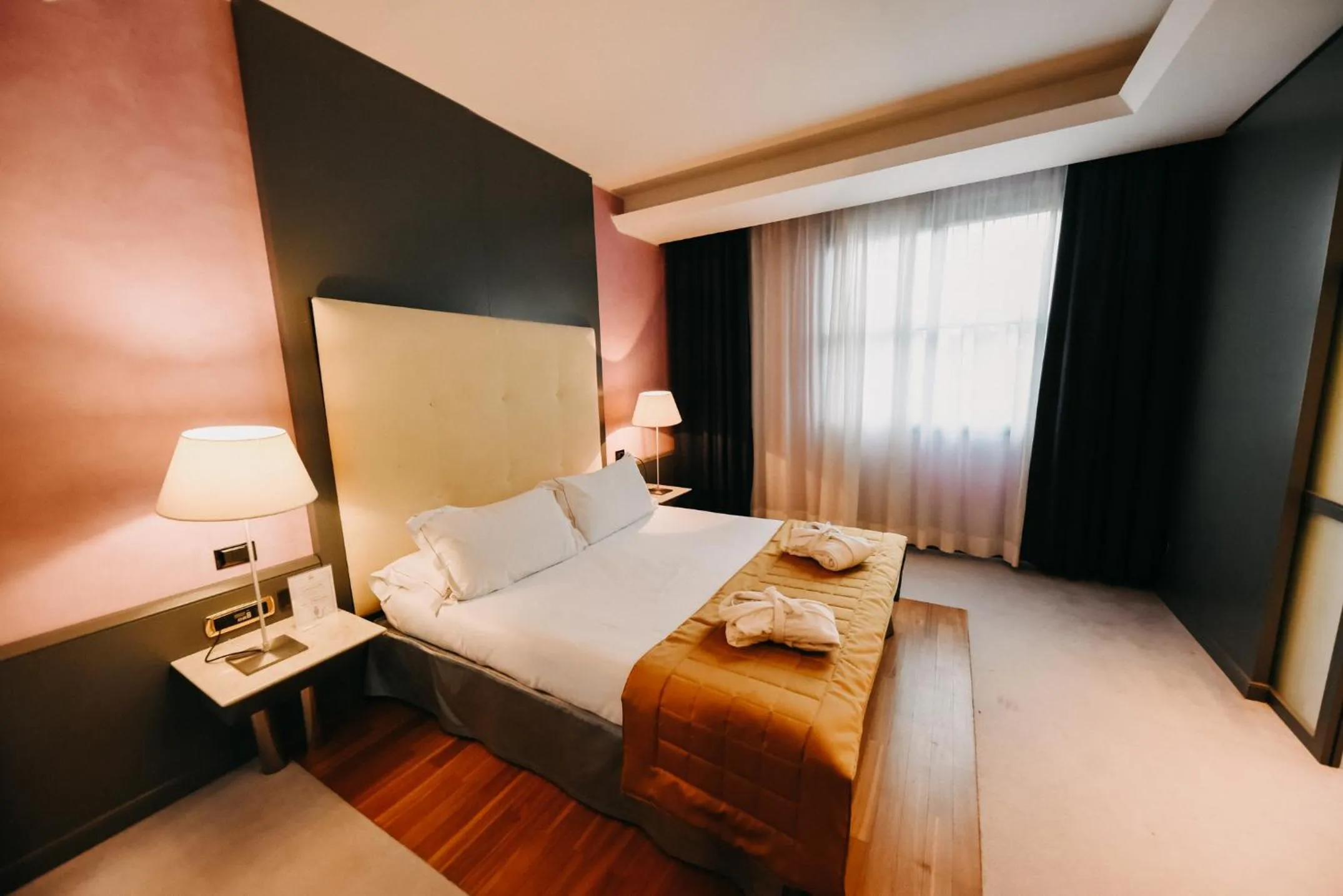 Bed in SHG Hotel Antonella