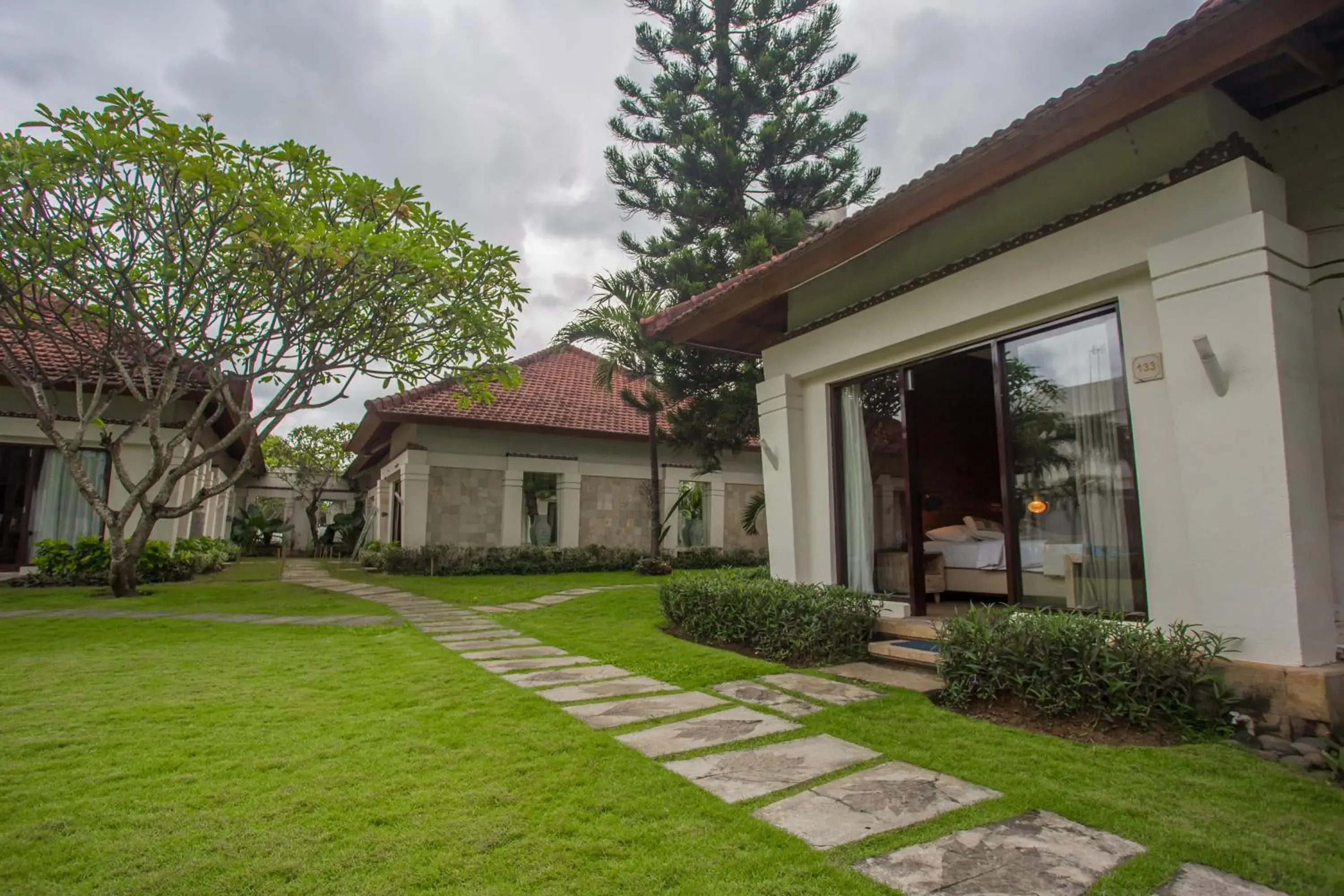 Garden, Property Building in Bali Breezz Hotel