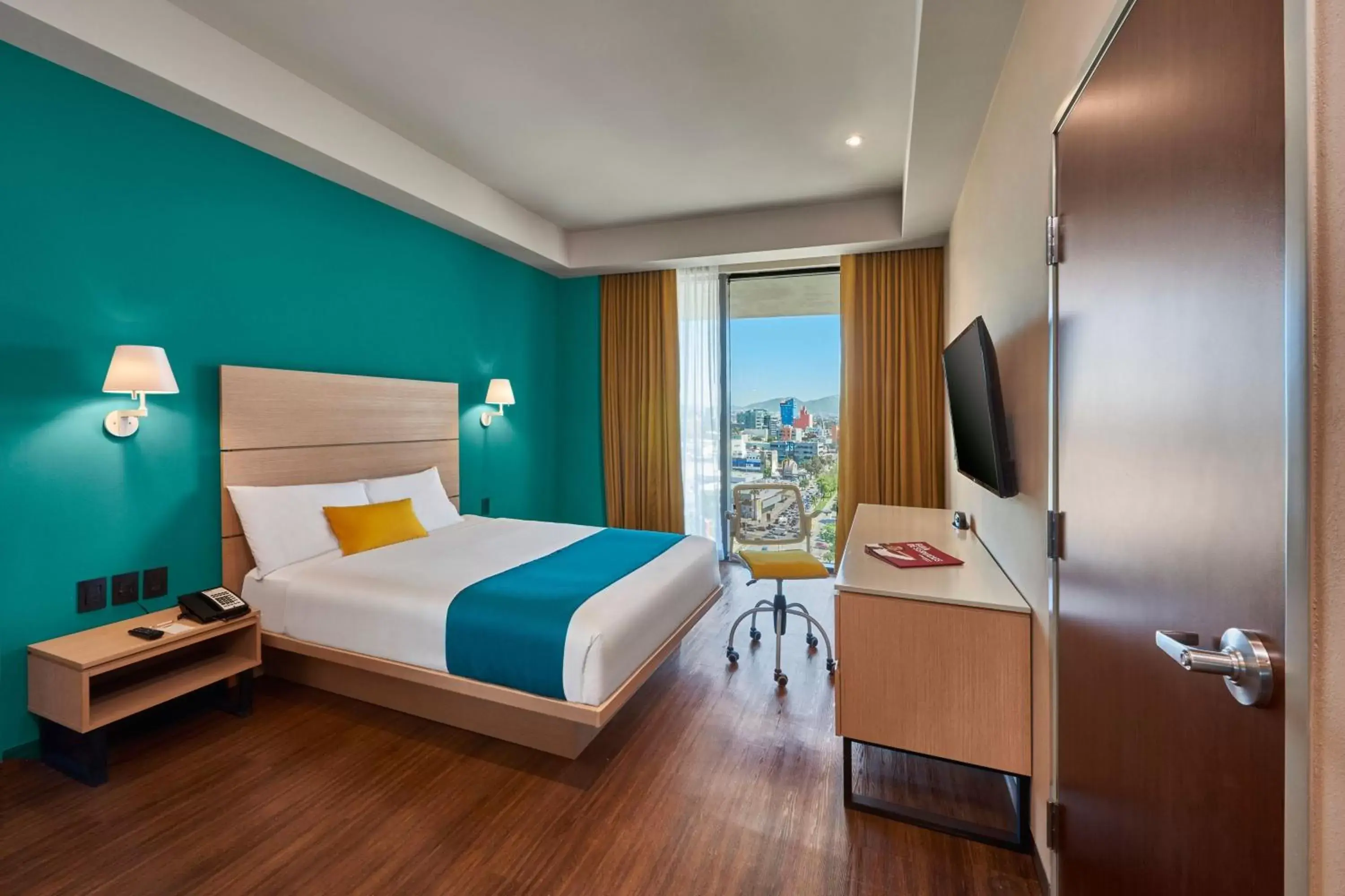 Photo of the whole room, Bed in City Express Suites by Marriott Tijuana Rio