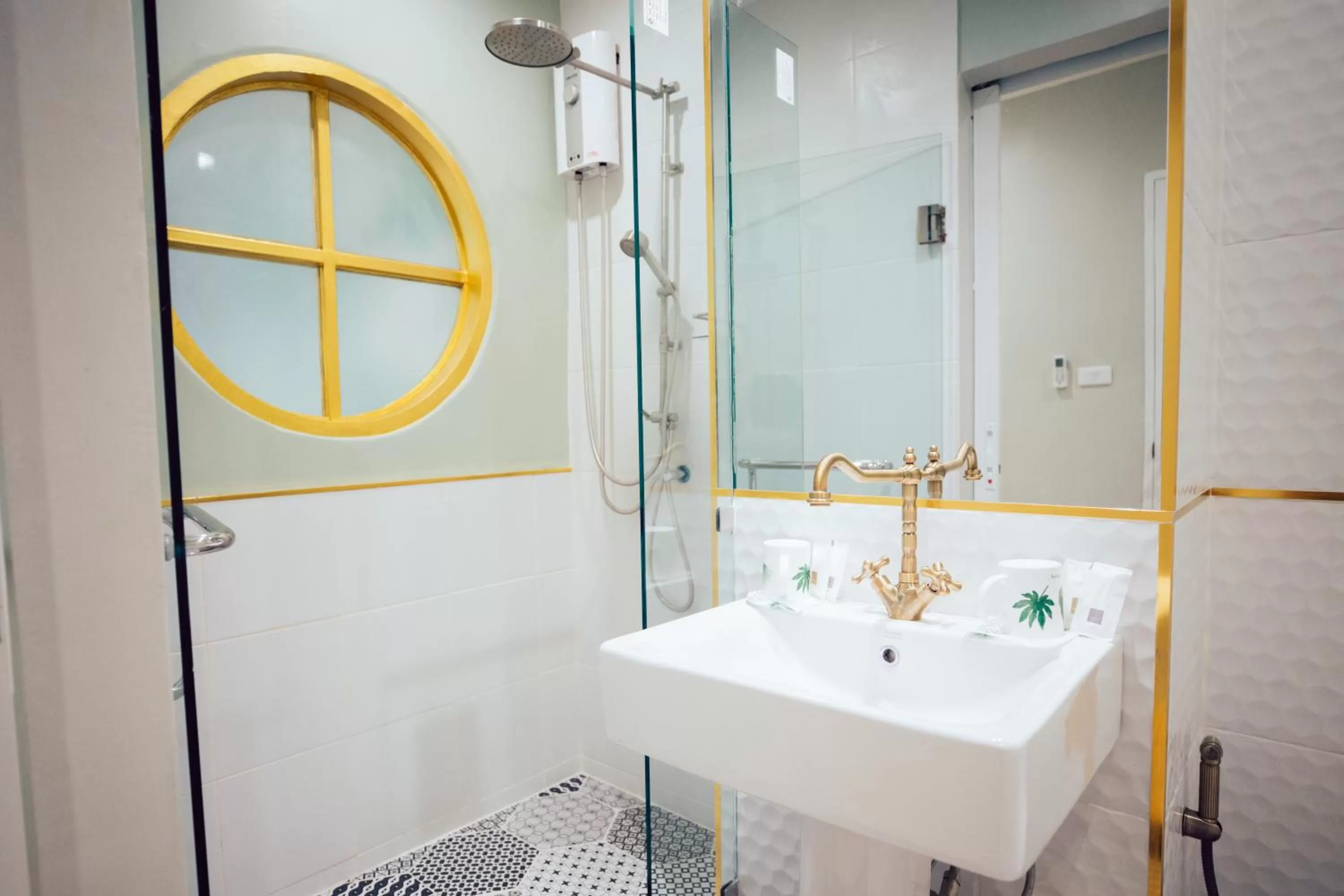 Bathroom in J's Cafe and Poshtel