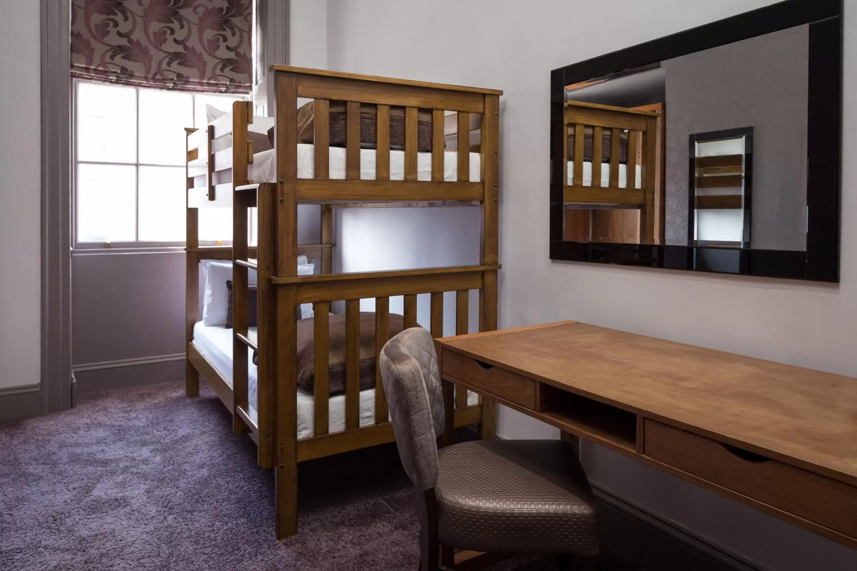 bunk bed in Roomzzz Newcastle City