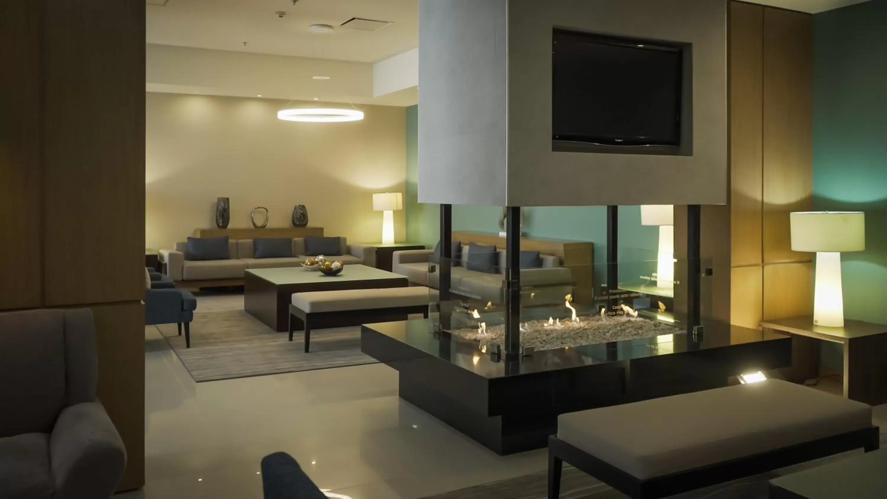 Living room, Seating Area in Staybridge Suites Guadalajara Expo, an IHG Hotel