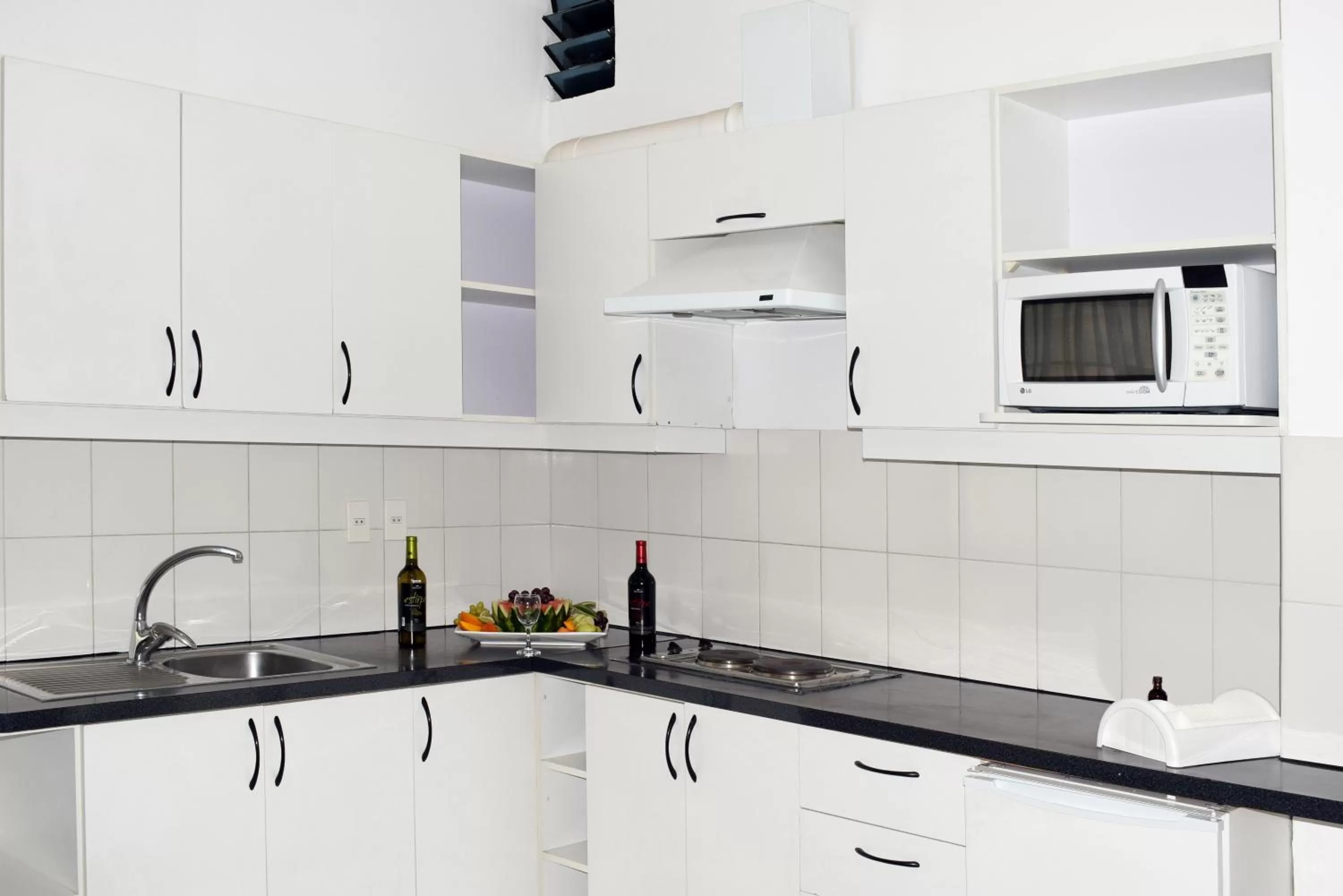 Kitchen or kitchenette in Delfines Apart Hotel