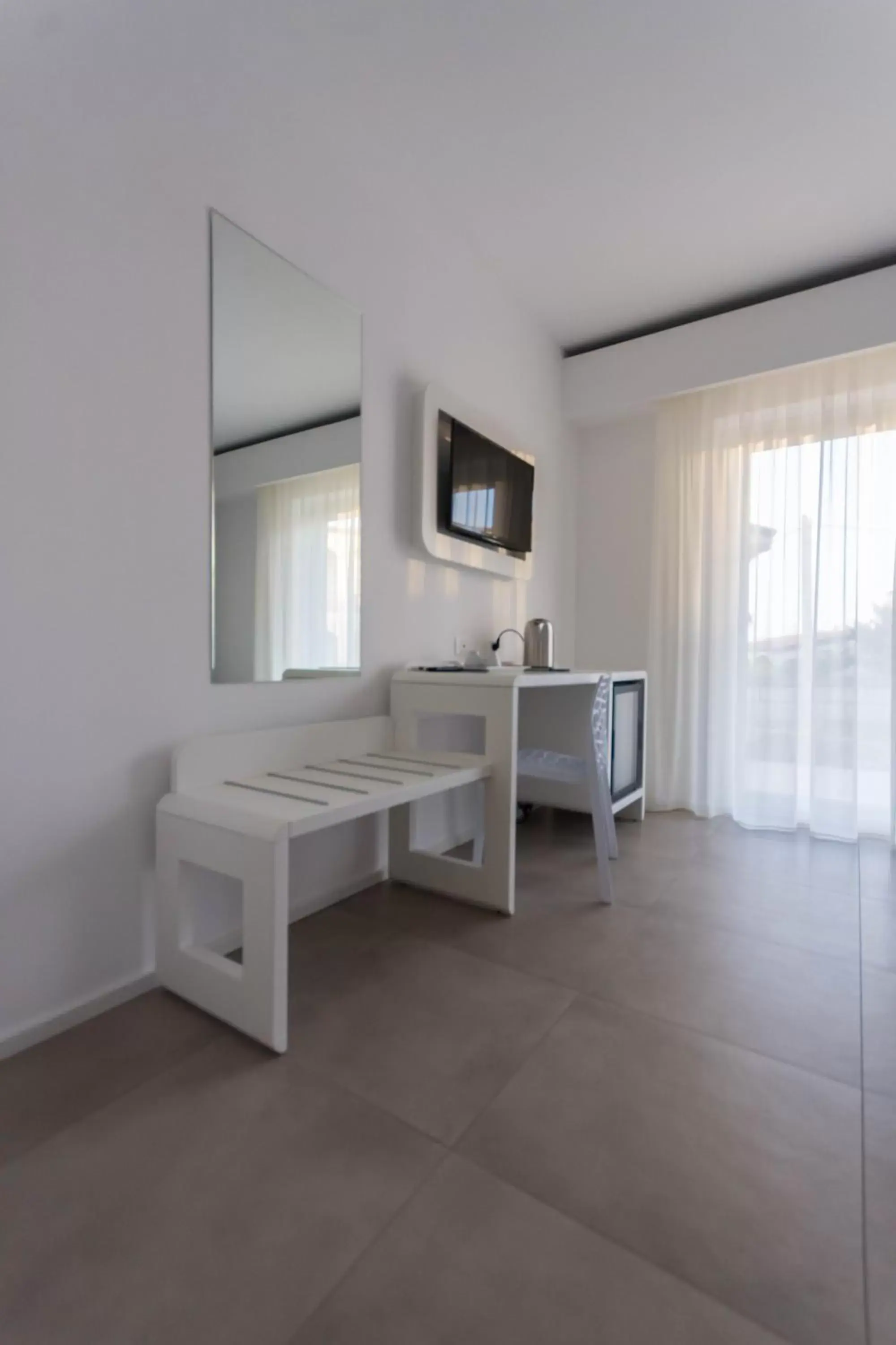 Photo of the whole room, TV/Entertainment Center in Aether Suites Tropea - Free Parking