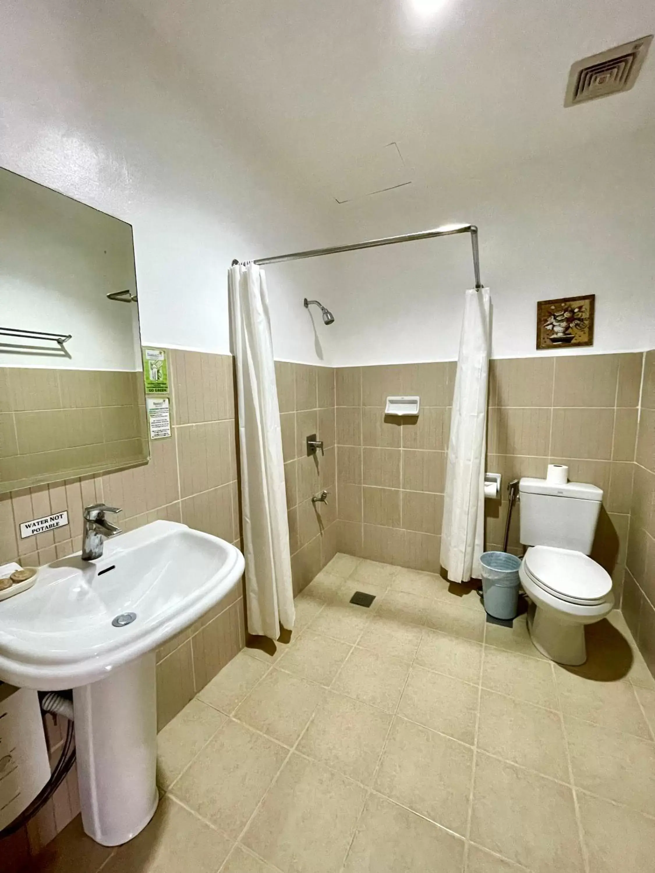 Bathroom in Palmbeach Resort & Spa