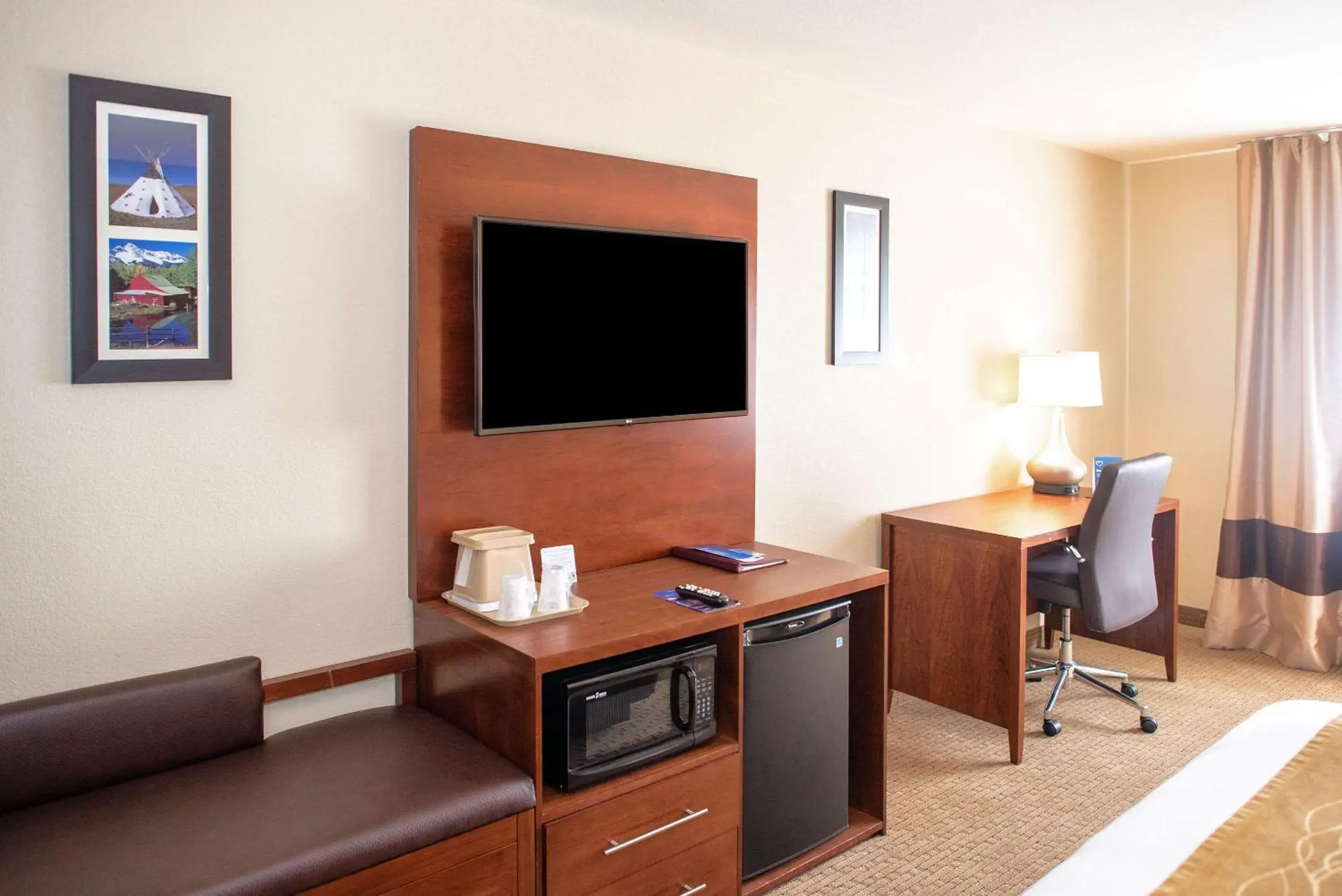 Photo of the whole room, TV/Entertainment Center in Comfort Inn & Suites Near Custer State Park and Mt Rushmore