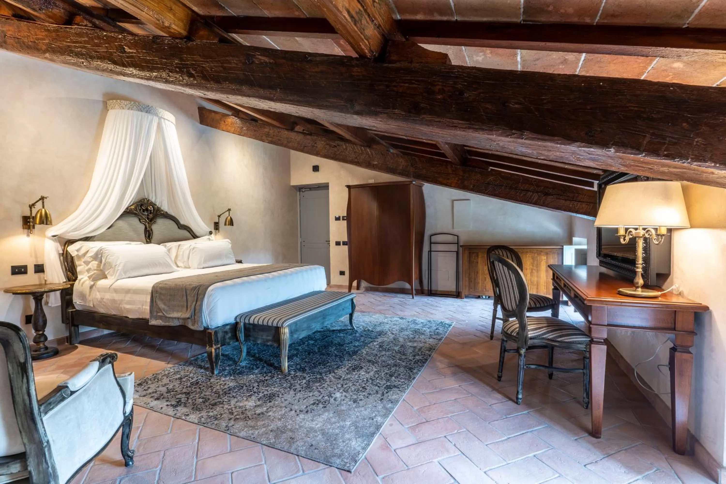 Bed in Villa Petriolo - Small Luxury Hotels of the World