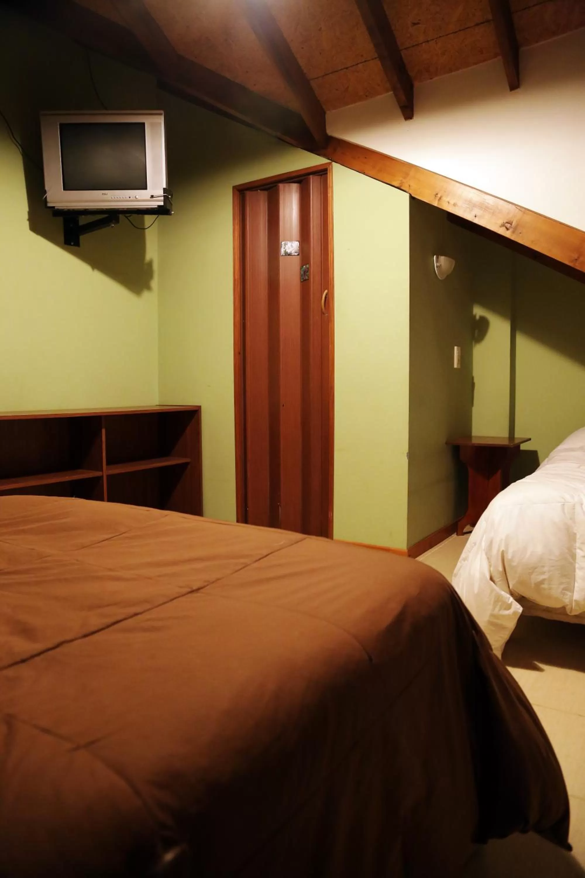 Bedroom, Bed in Mirador del Beagle Hosteria