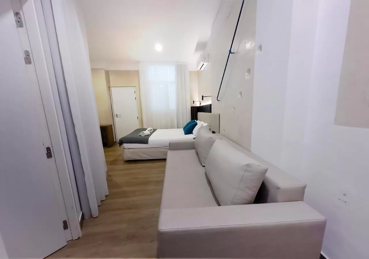 Bed in ISA Sevilla Suites