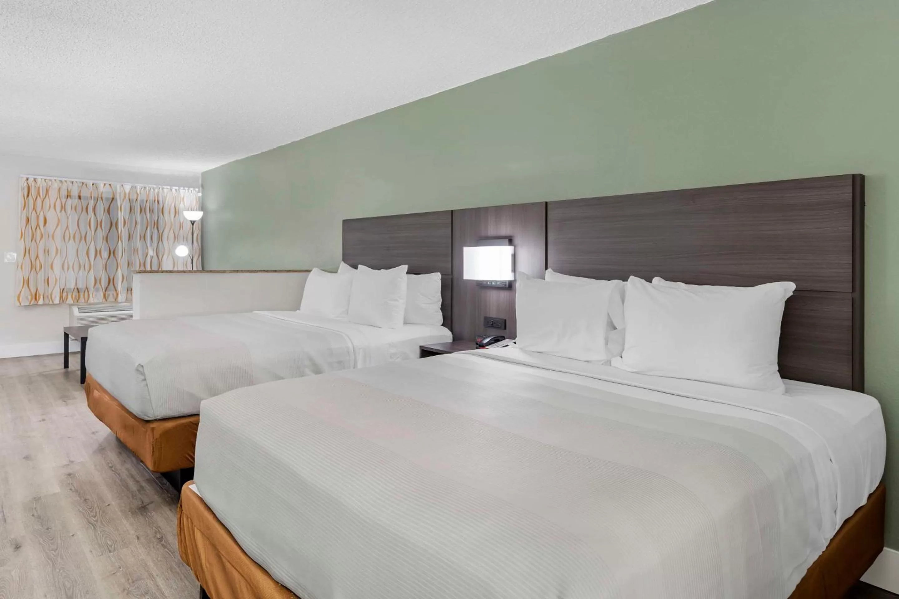 Bedroom, Bed in Quality Inn & Suites Orlando East - UCF Area