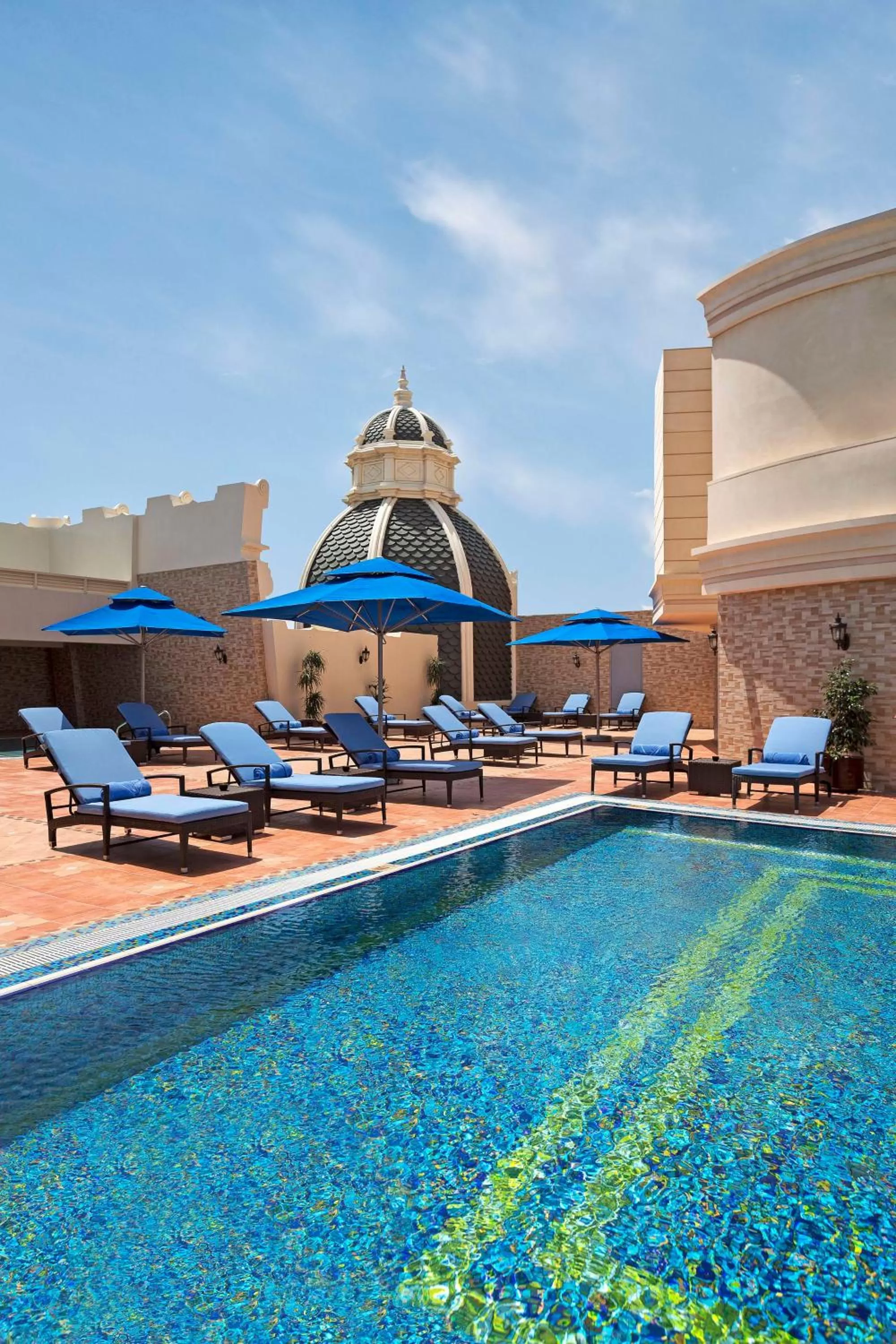 Pool view in Royal Rose Abu Dhabi, a Curio Collection by Hilton Affiliated Hotel