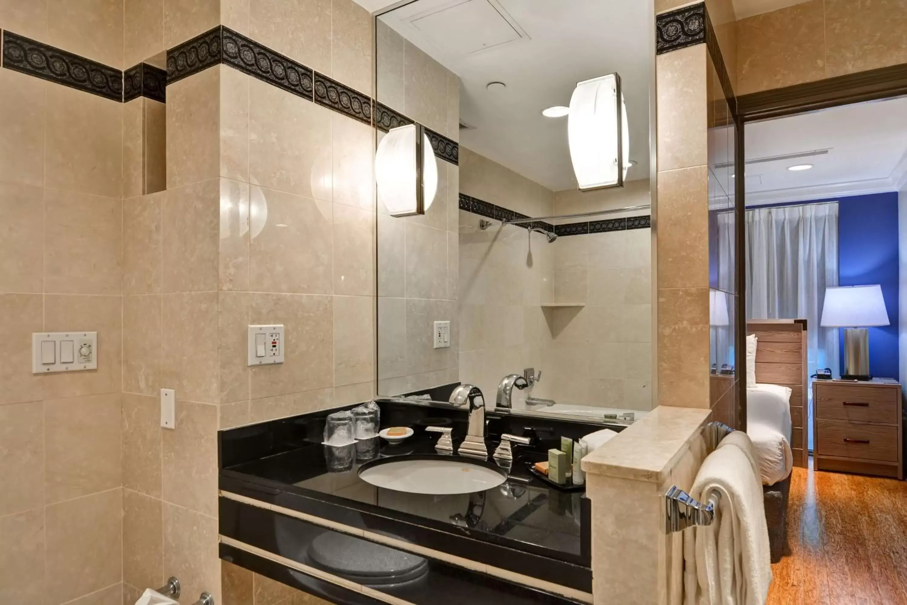 Bathroom in The Cincinnatian Curio Collection by Hilton