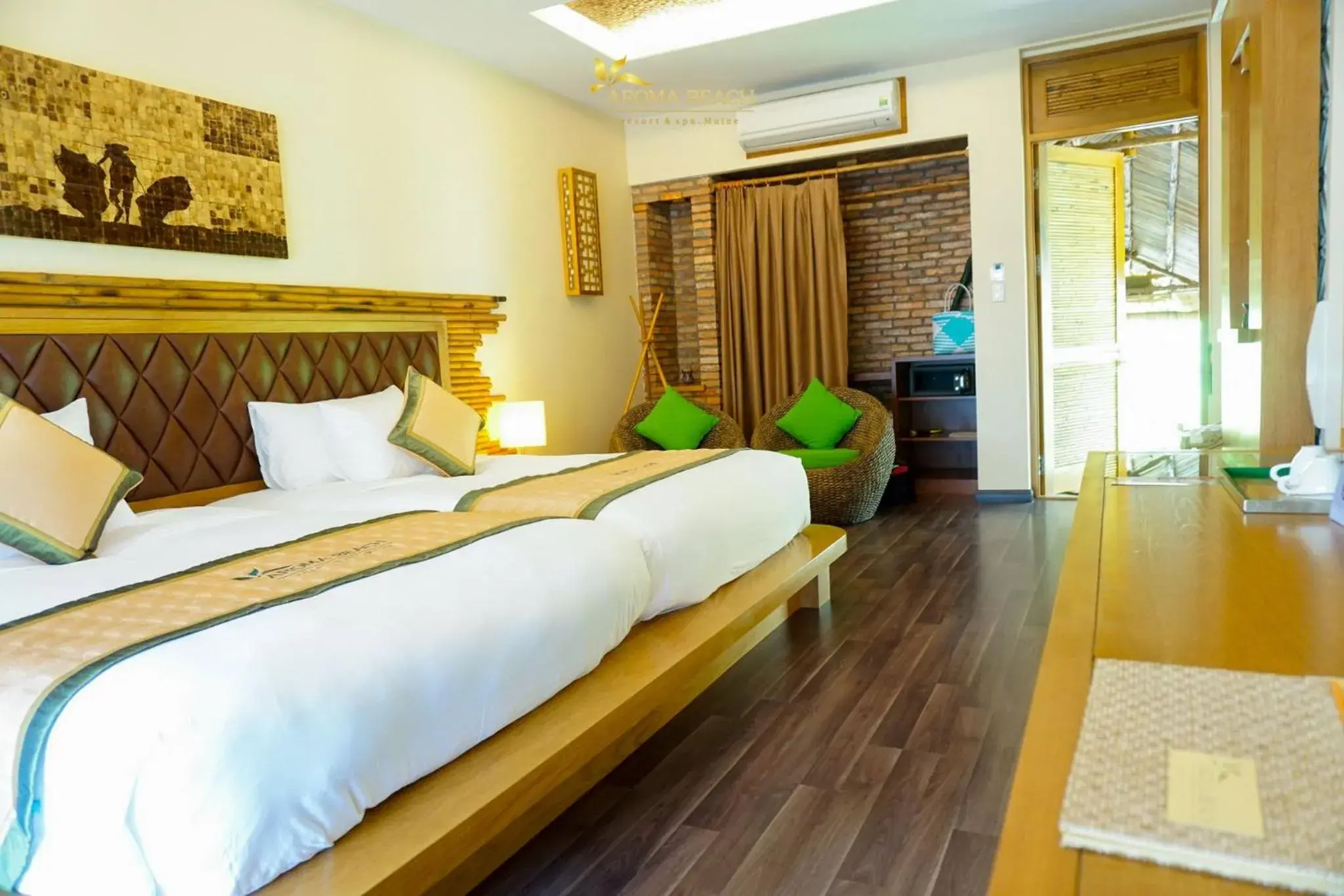 Bed in Aroma Beach Resort and Spa