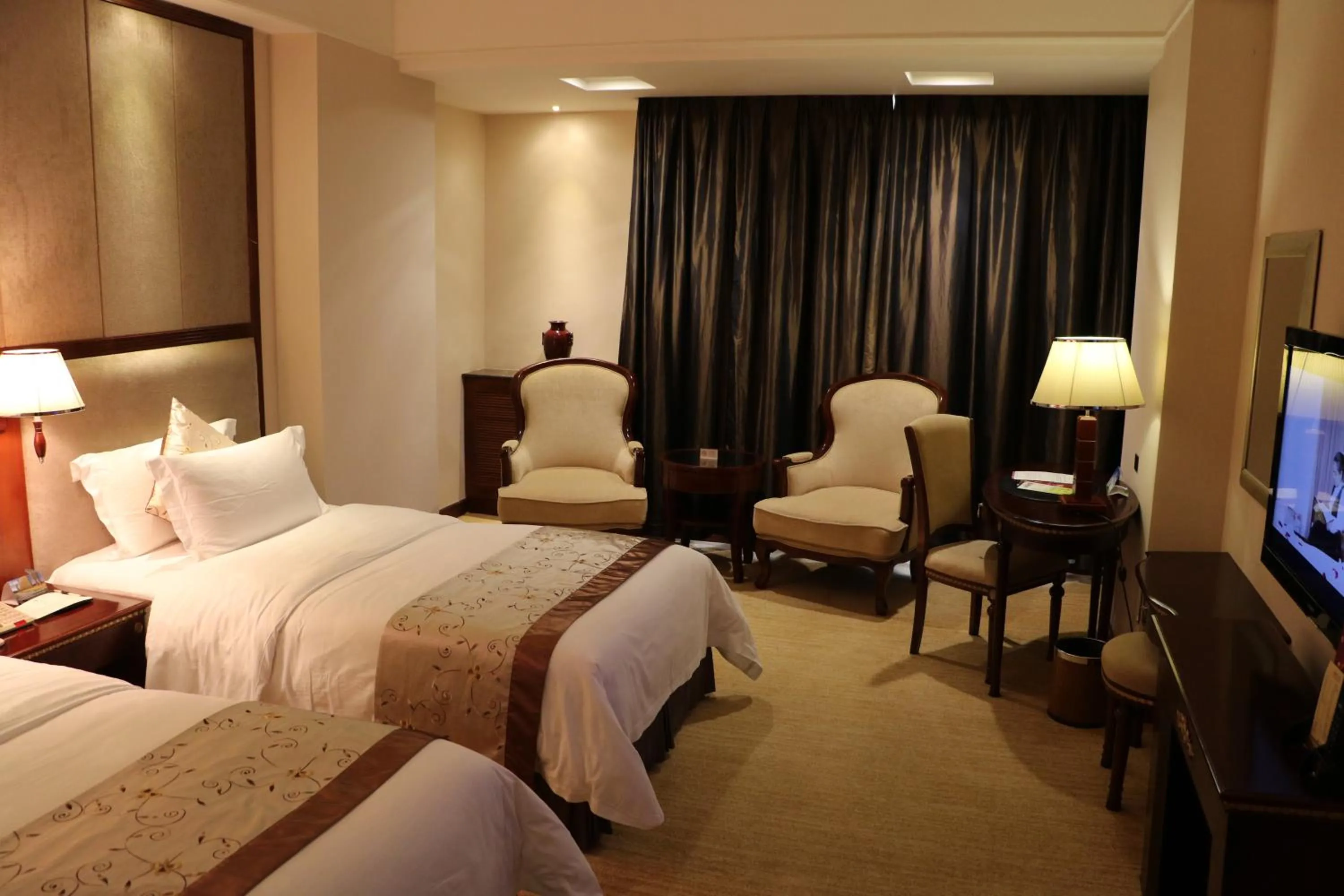Bed in Rongjiang Hotel