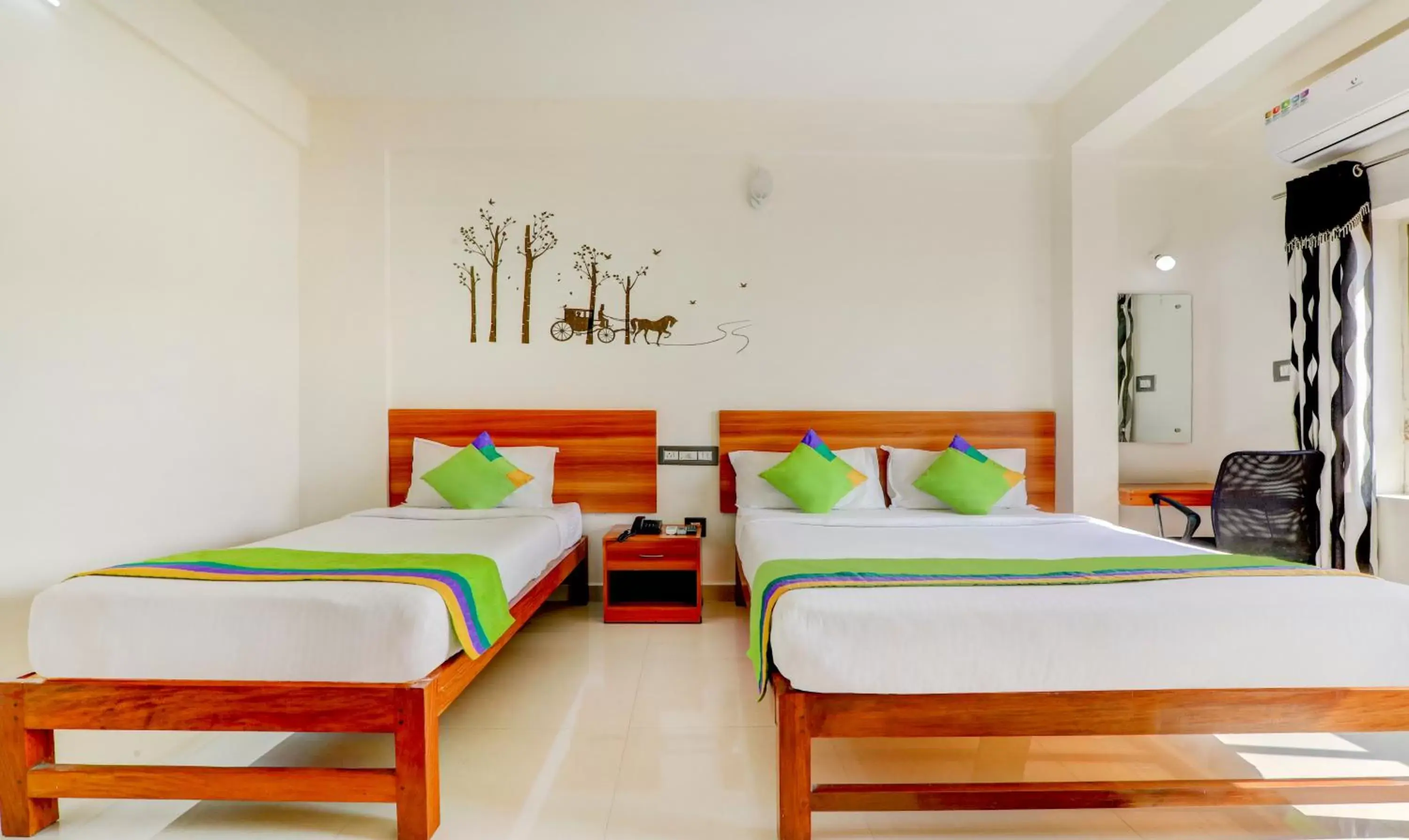 Bedroom, Bed in Treebo Atithi Comforts, 1 Km From Nisargadhama Forest Bedroom, Bed in Treebo Atithi Comforts, 1 Km From Nisargadhama Forest