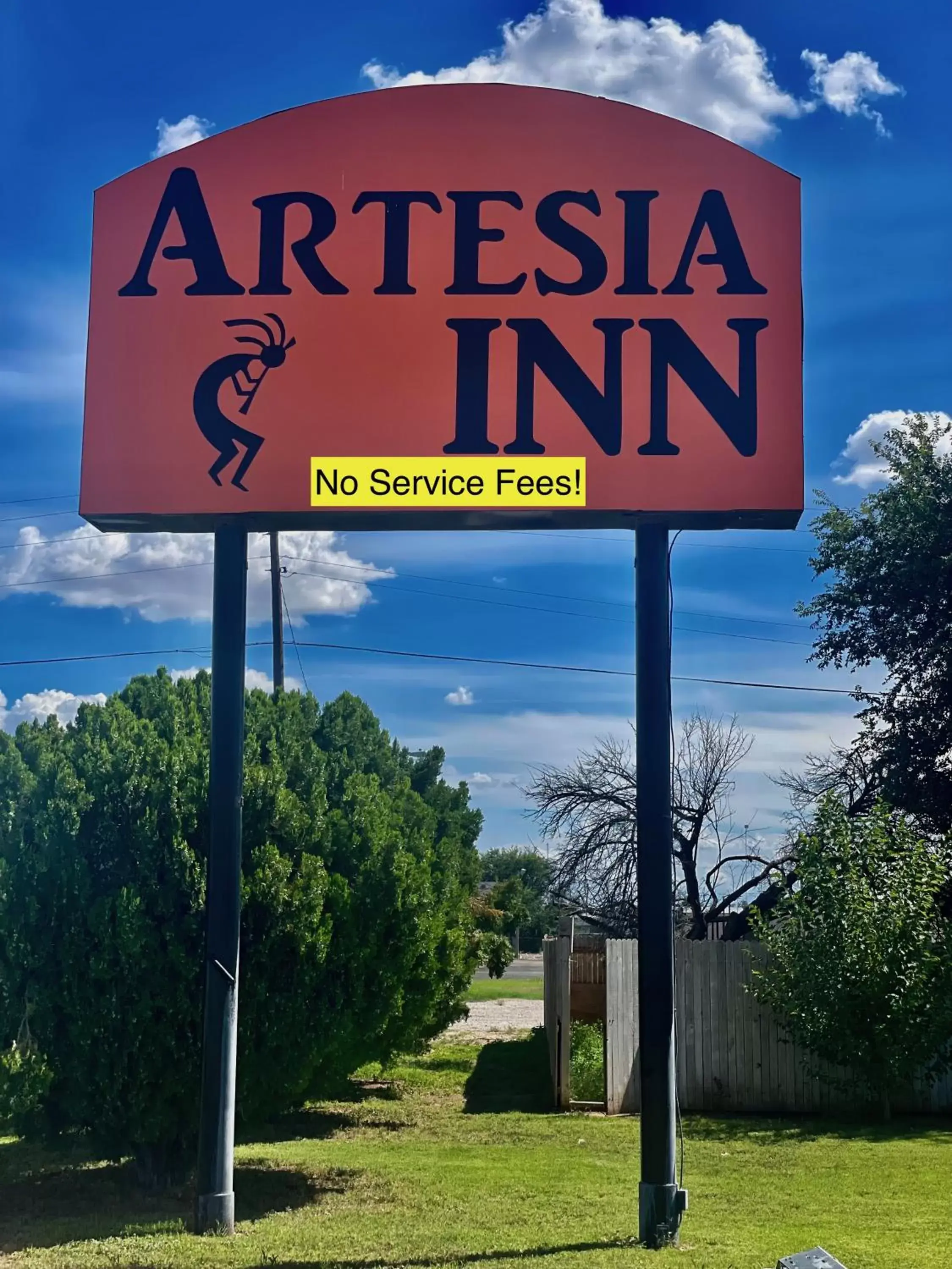 Property building in Artesia Inn- No Service Fees
