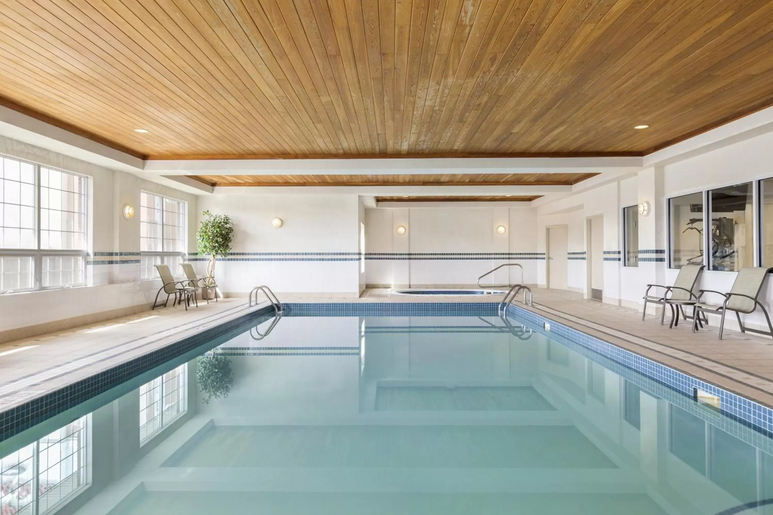 Swimming pool in Country Inn & Suites by Radisson, Calgary-Northeast Swimming pool in Country Inn & Suites by Radisson, Calgary-Northeast