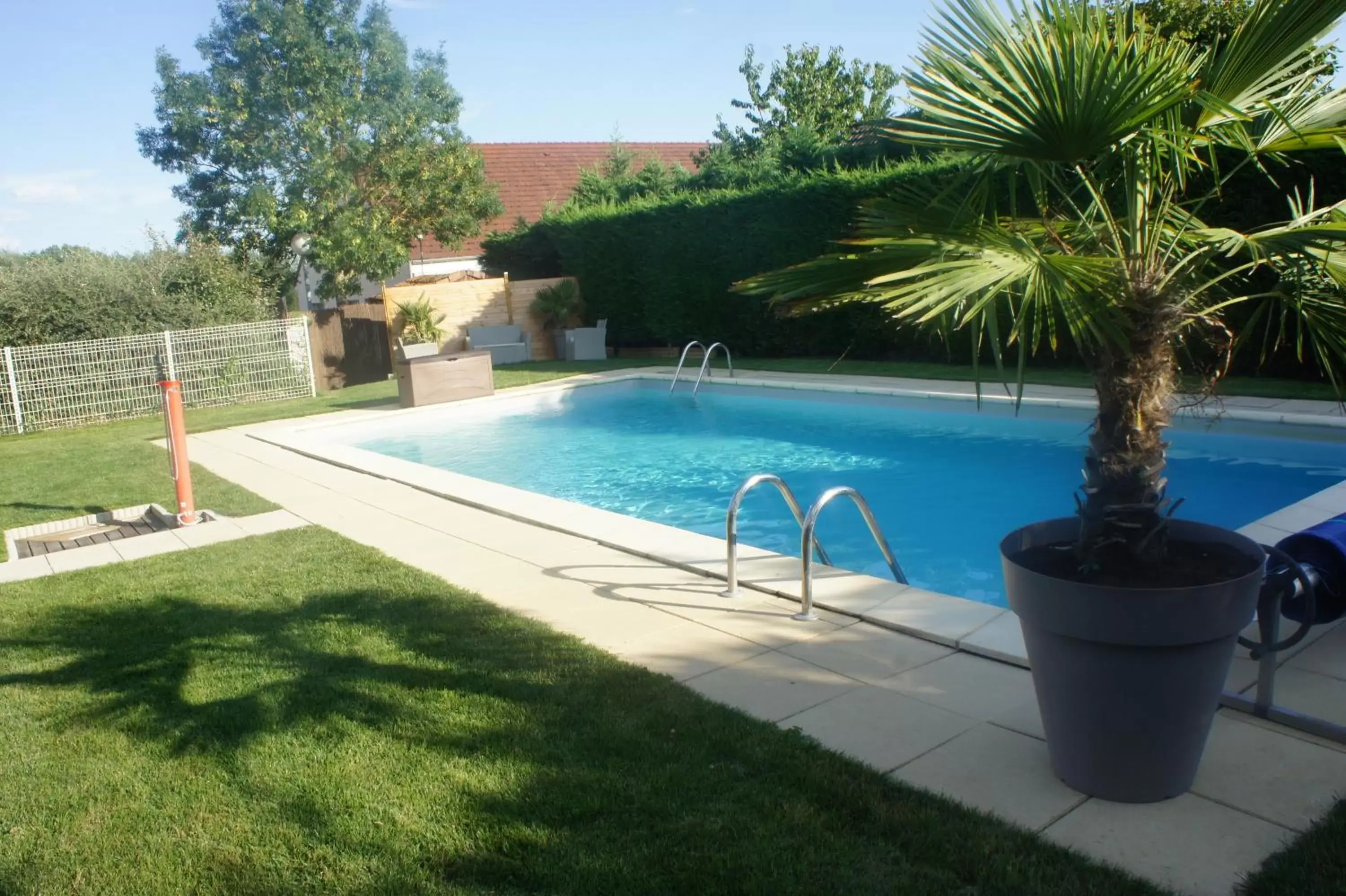 Day, Swimming Pool in Hôtel Le Clos Badan