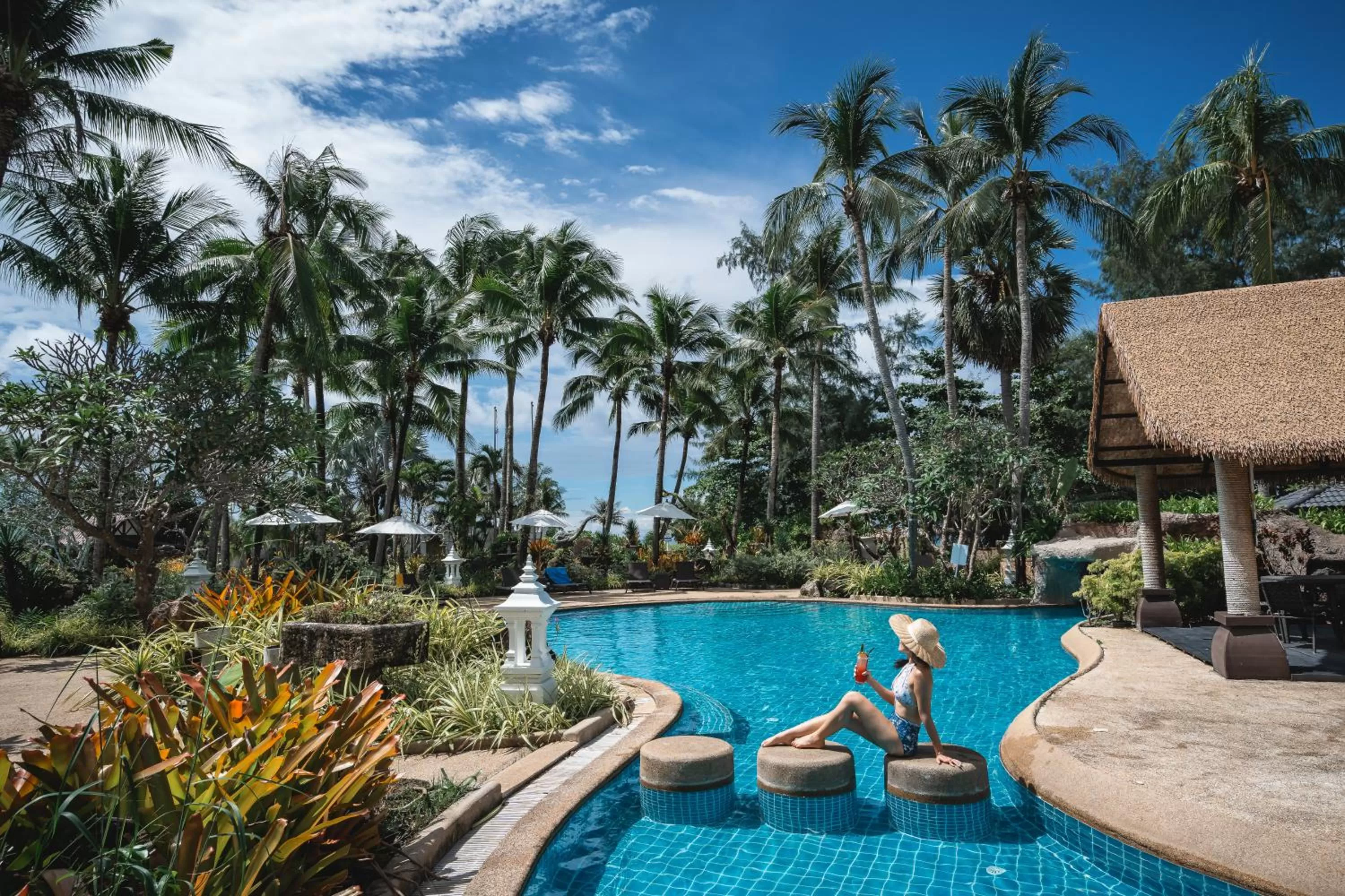 Swimming pool in Thavorn Palm Beach Resort Phuket
