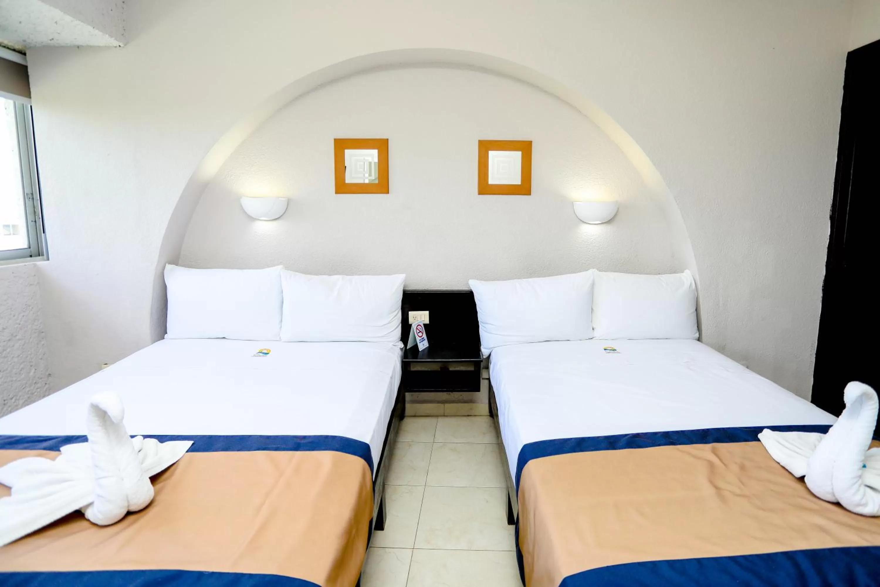 Bed in Hotel Caribe Internacional Cancun