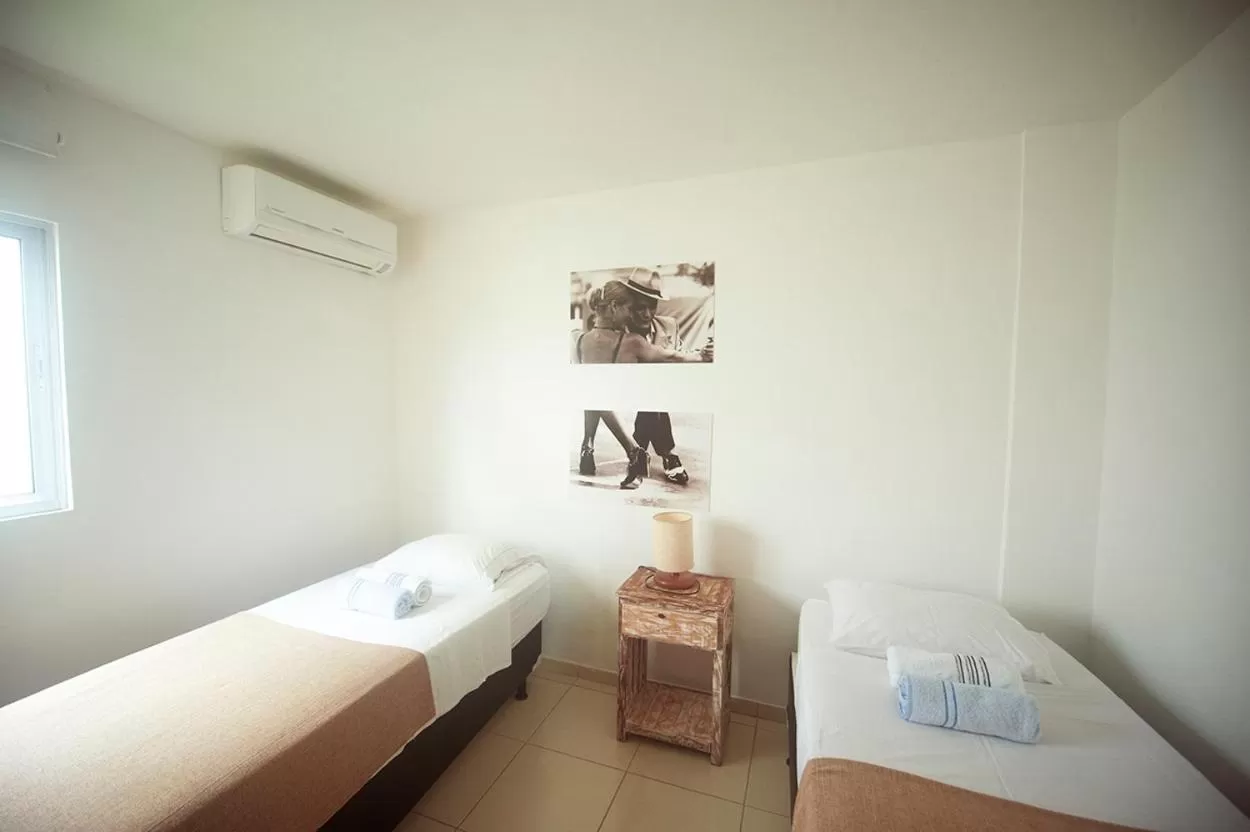 Bed in Manga Verde Beach Residence