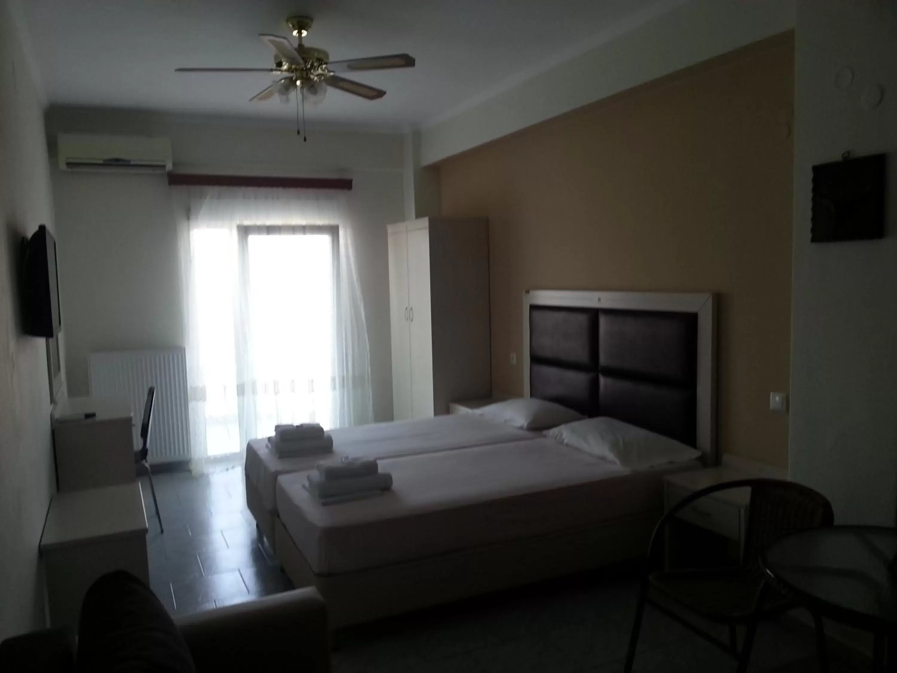 Photo of the whole room, Bed in Alexandros Hotel