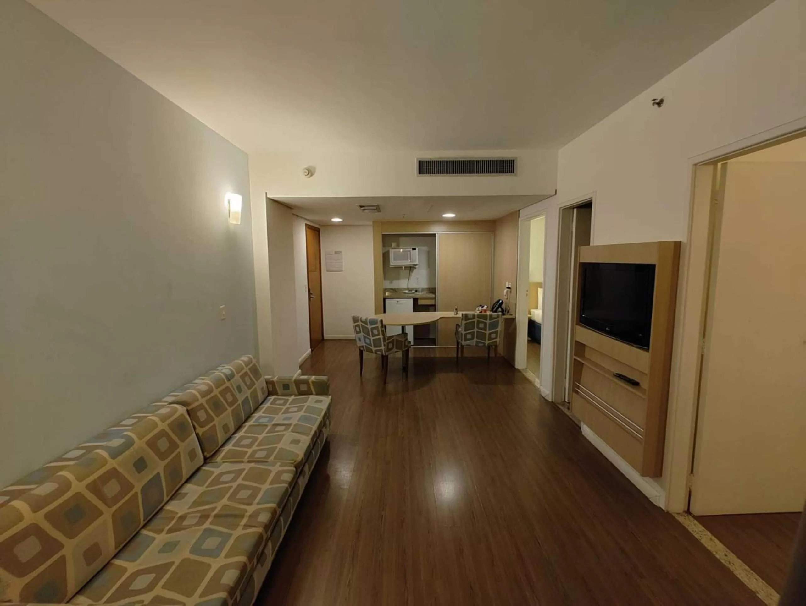 Photo of the whole room, Seating Area in Summit Suítes Hotel Santos