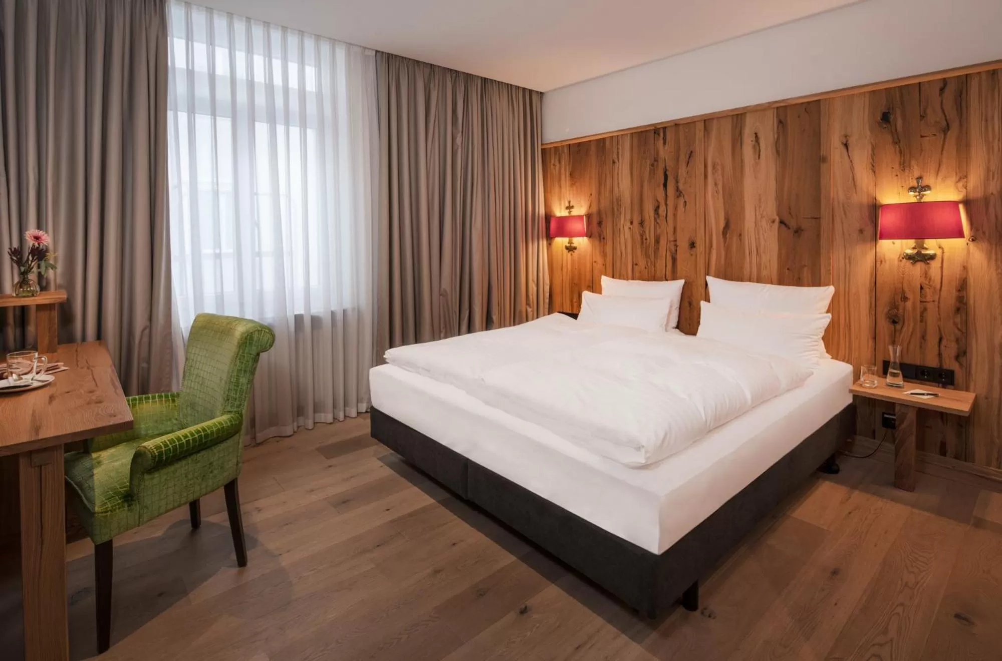 Bed in Eden Hotel Wolff