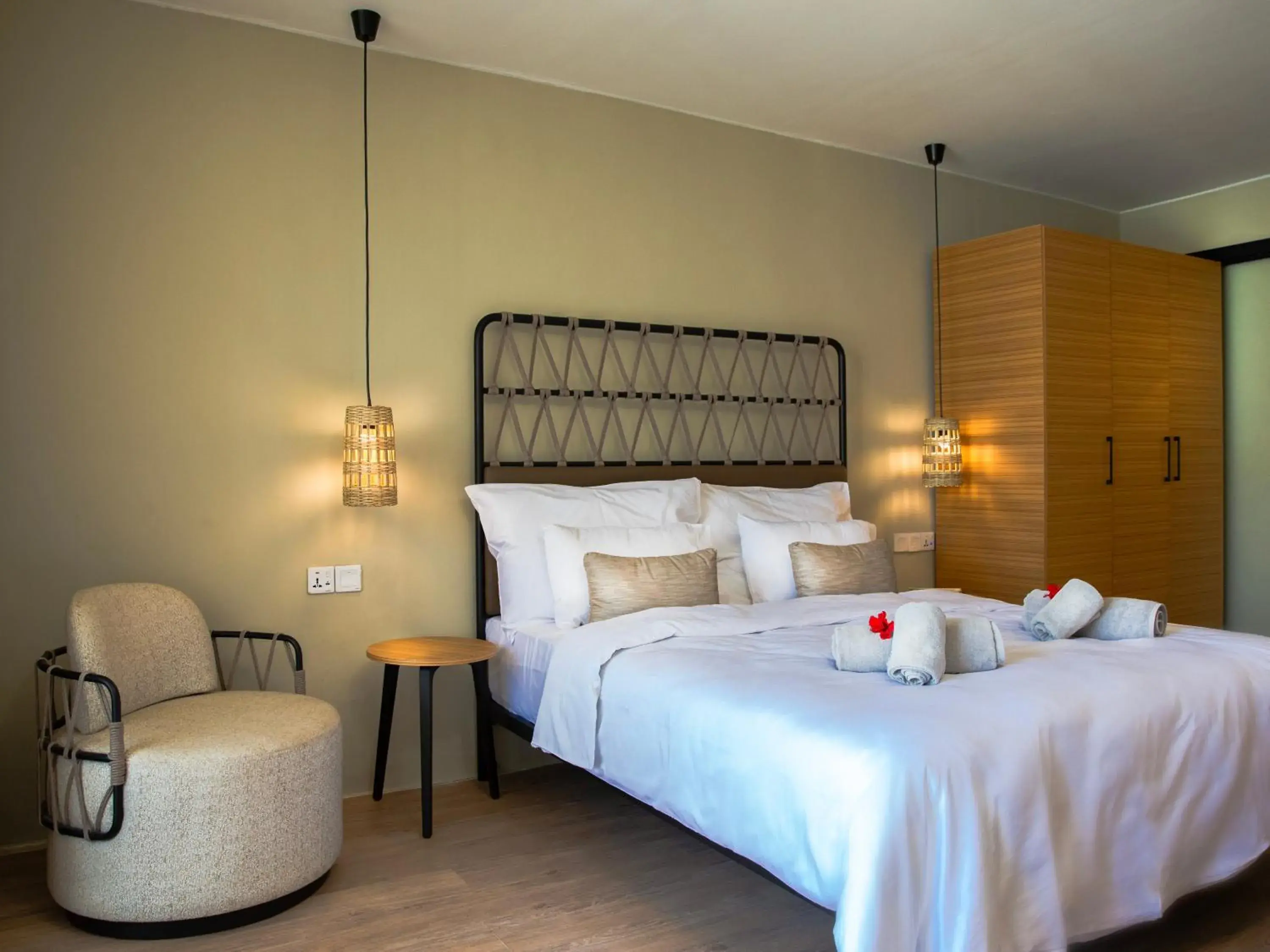 Bed in KOMBO BEACH HOTEL