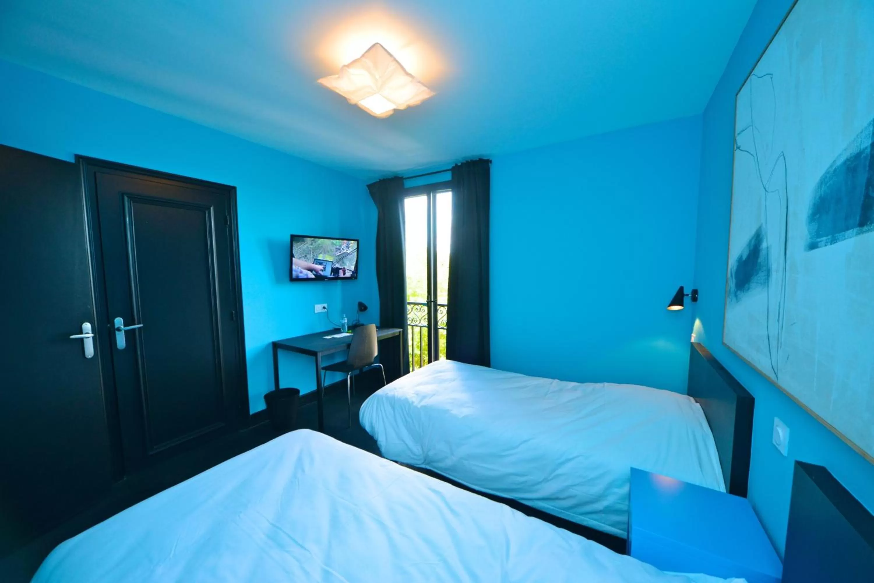 Bed in Logis - Hotel Restaurant La Mire