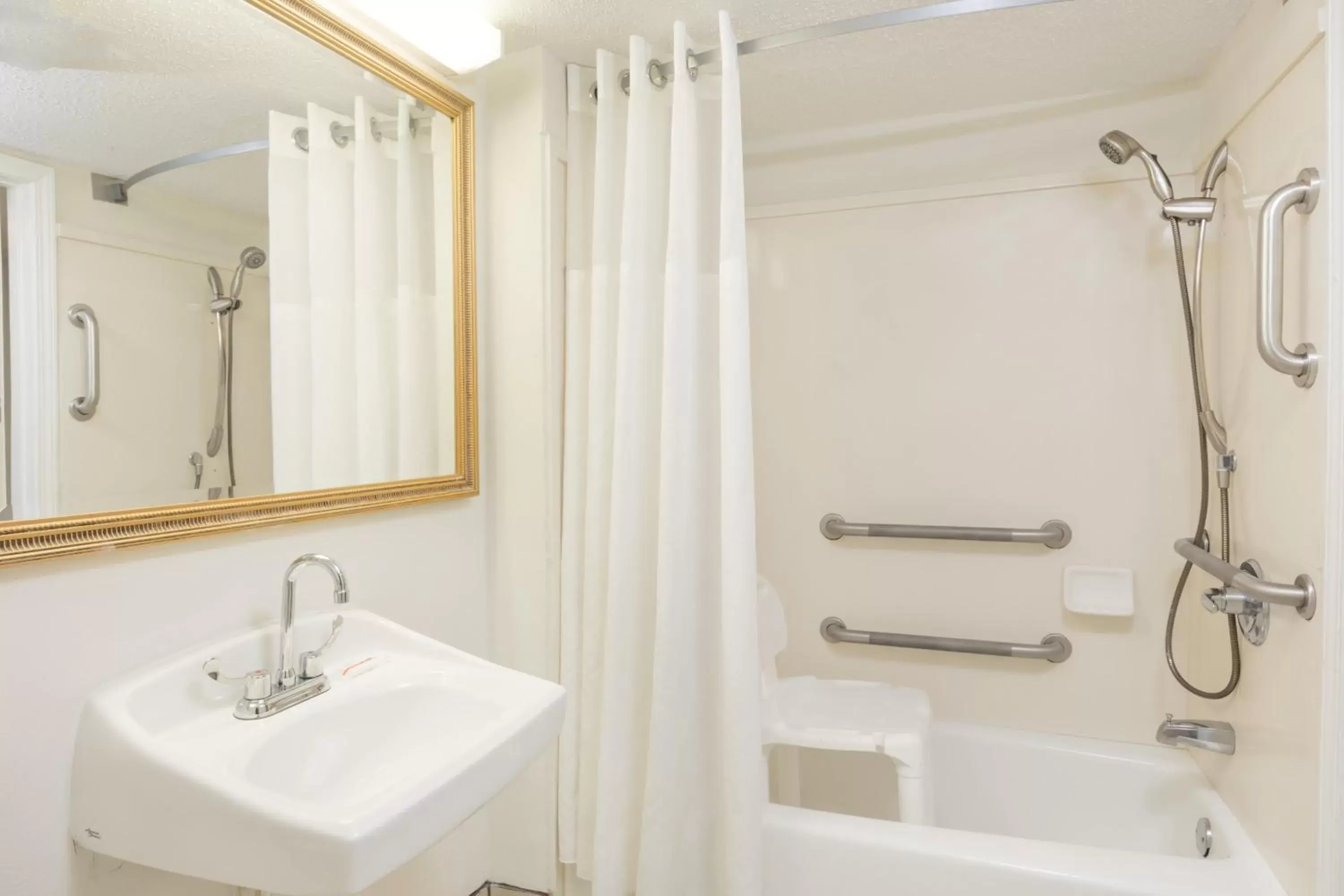 Bathroom in Days Inn by Wyndham Biloxi Beach