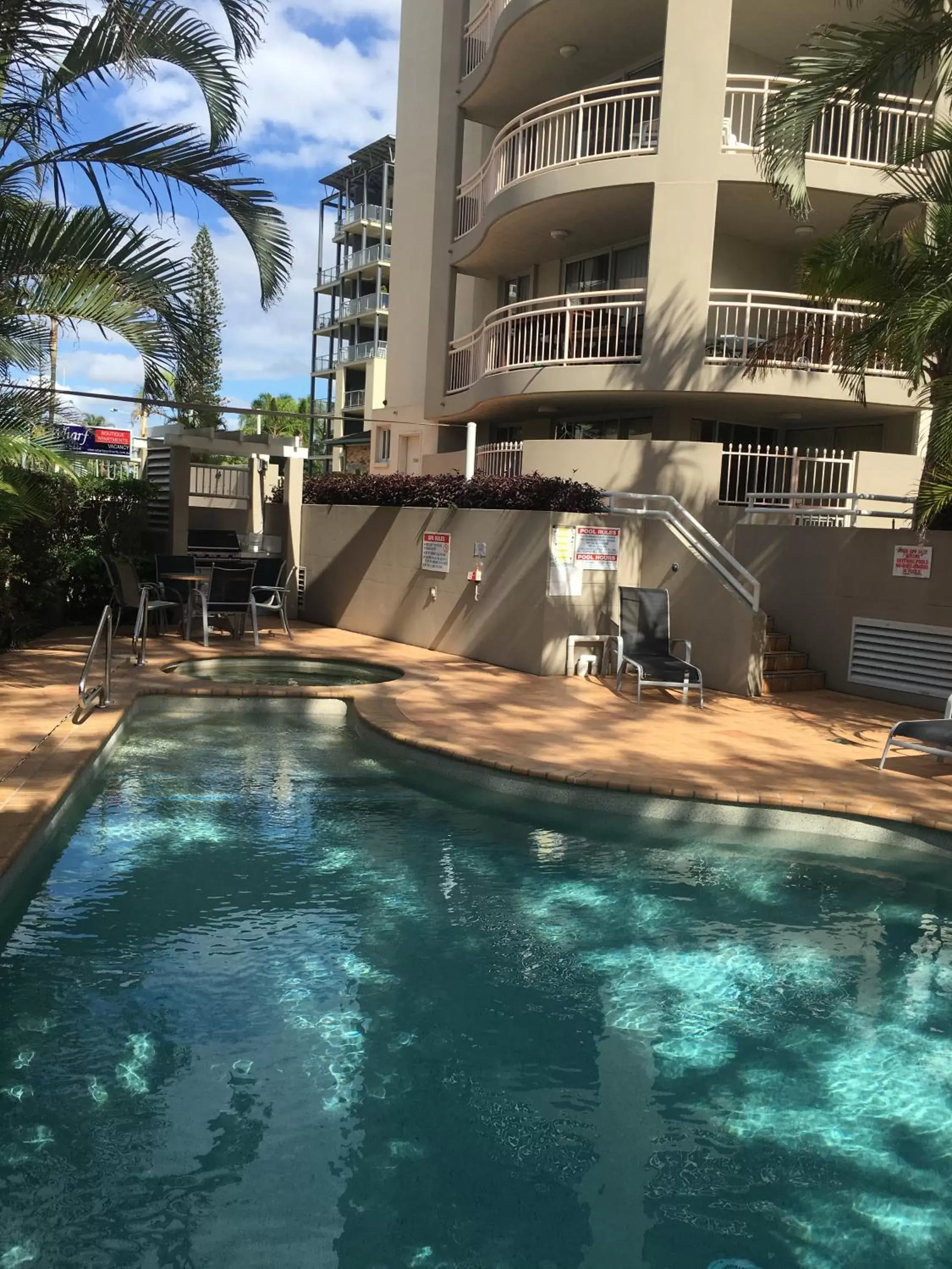 Swimming pool, Property Building in Wharf Boutique Apartments