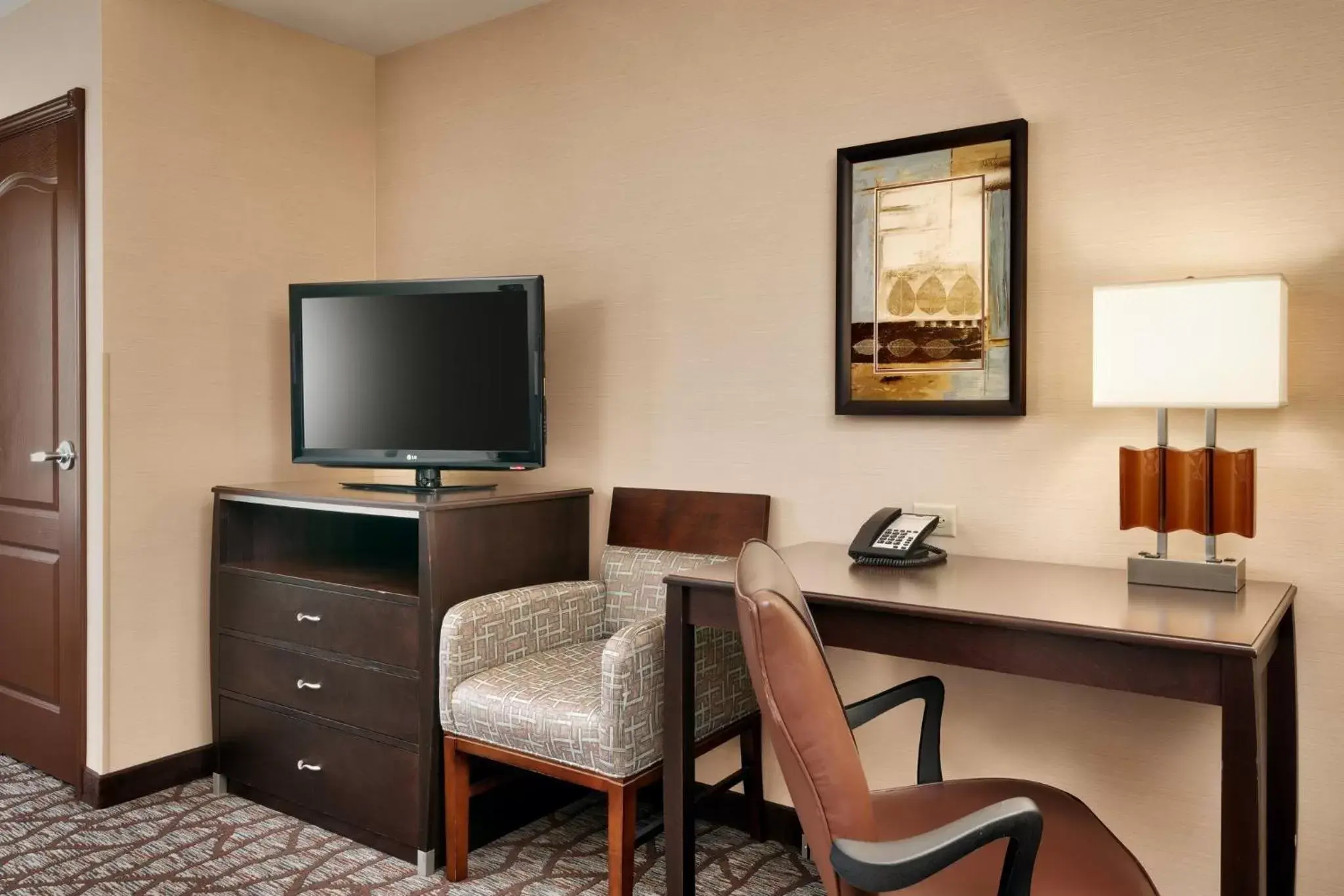 Photo of the whole room, TV/Entertainment Center in Holiday Inn Express Hotel & Suites Butte, an IHG Hotel