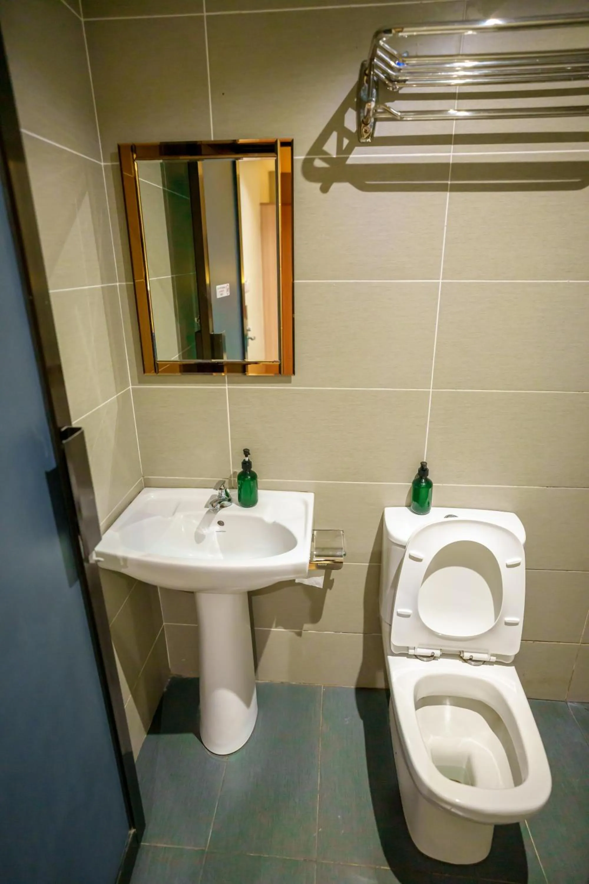 Toilet in Alaxis Hotel